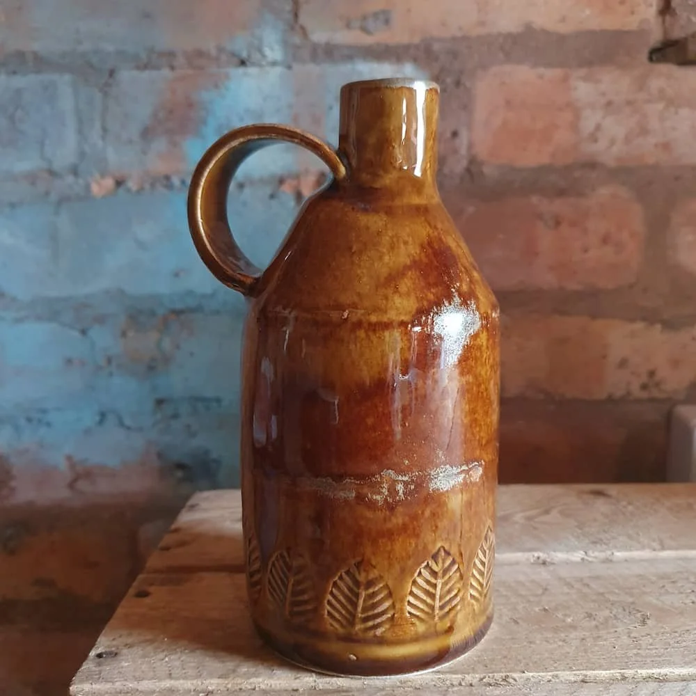 Brown pottery bottle
