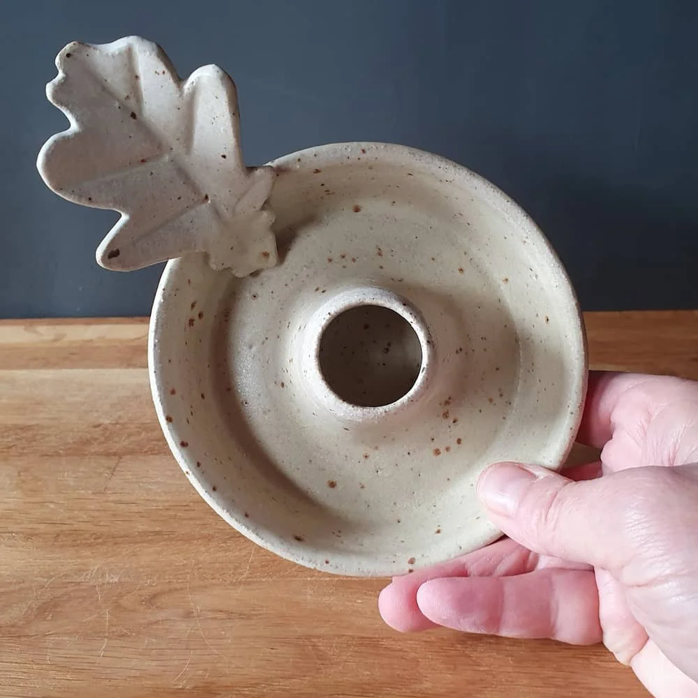 candle holder for hedge witch with oak leaf handle