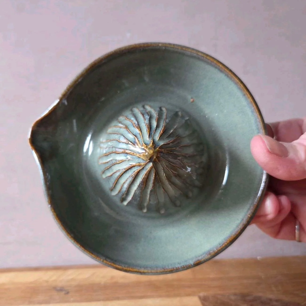 After a lot of practice, I&rsquo;m loving how these citrus juicers have turned out! 🍋 The earthy tones and textured details make each one extra special. What do you think of this design? 

#potterylife #rusticstyle #handmadeceramics