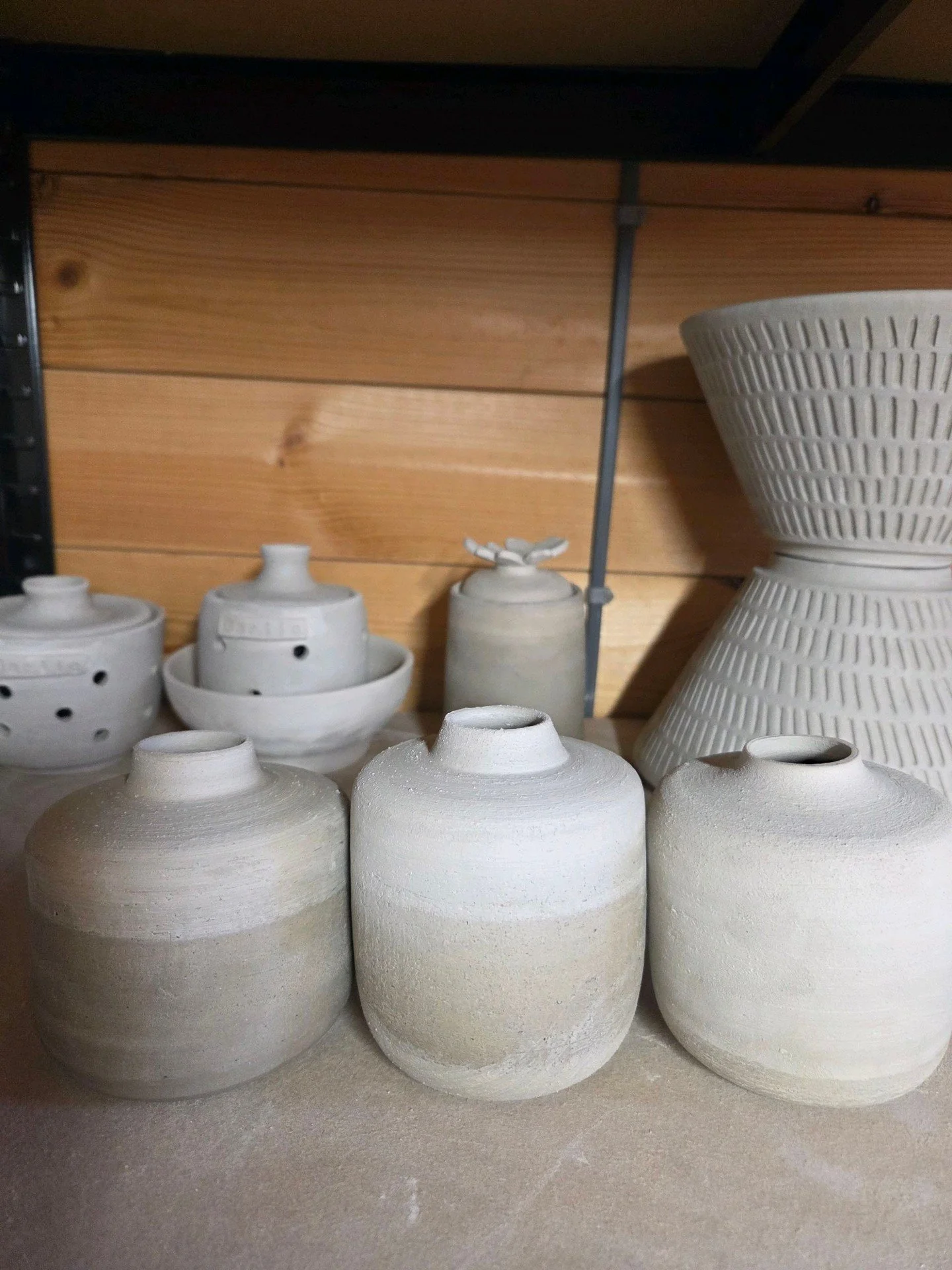 Current projects happening in the workshop 🌟 Here&rsquo;s a sneak peek at some wheel-thrown pieces in progress.

#potteryinprogress #handmadewithlove #ceramicart #rusticdecor