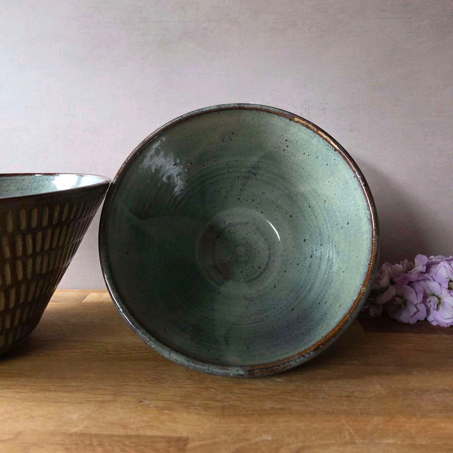 So here they are, my handmade conical carved bowls. I love how the glaze turned out - it highlights the carvings beautifully and adds such a rustic charm. These would look stunning as accent piece 🥰

#potteryart #homedecorideas