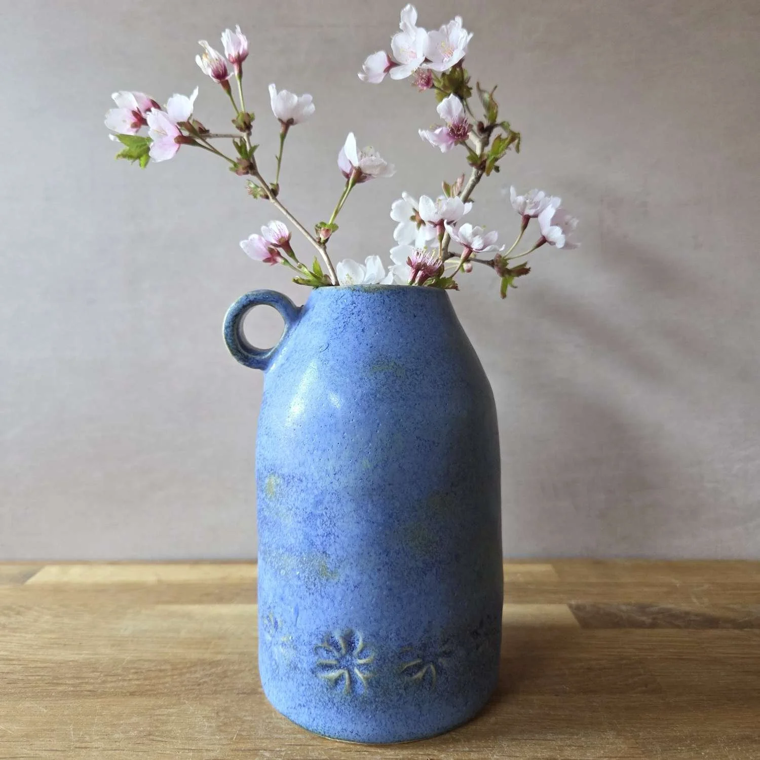 Handmade pottery vase cosmic blue flowers