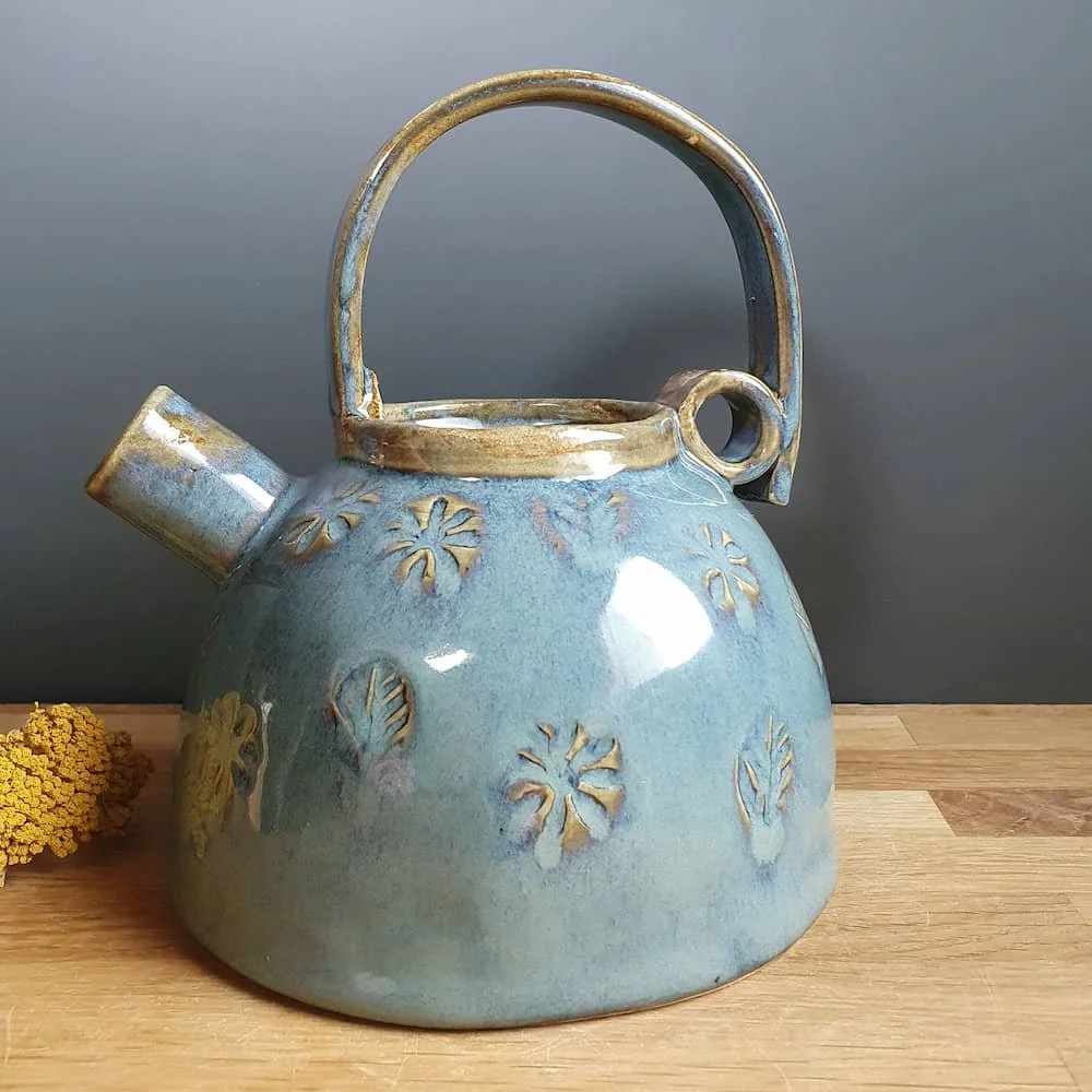 Kettle shaped pottery ornament