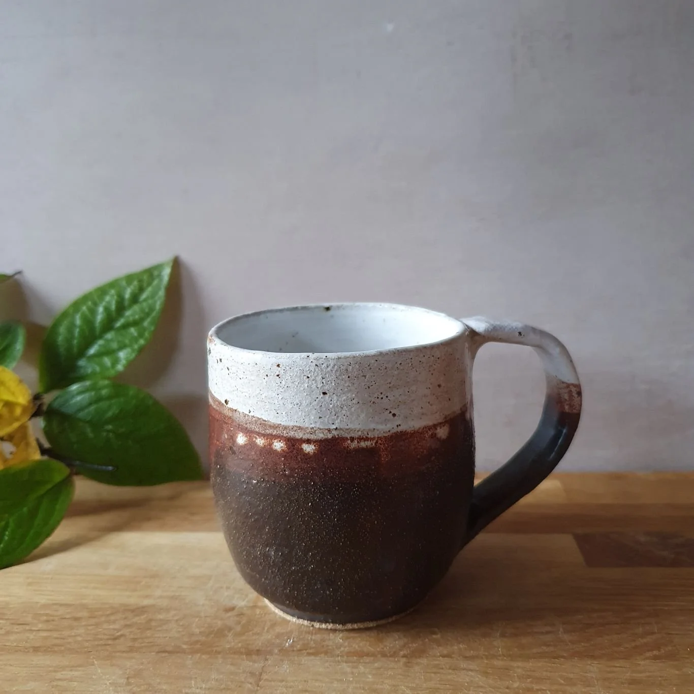 Brown and white cups