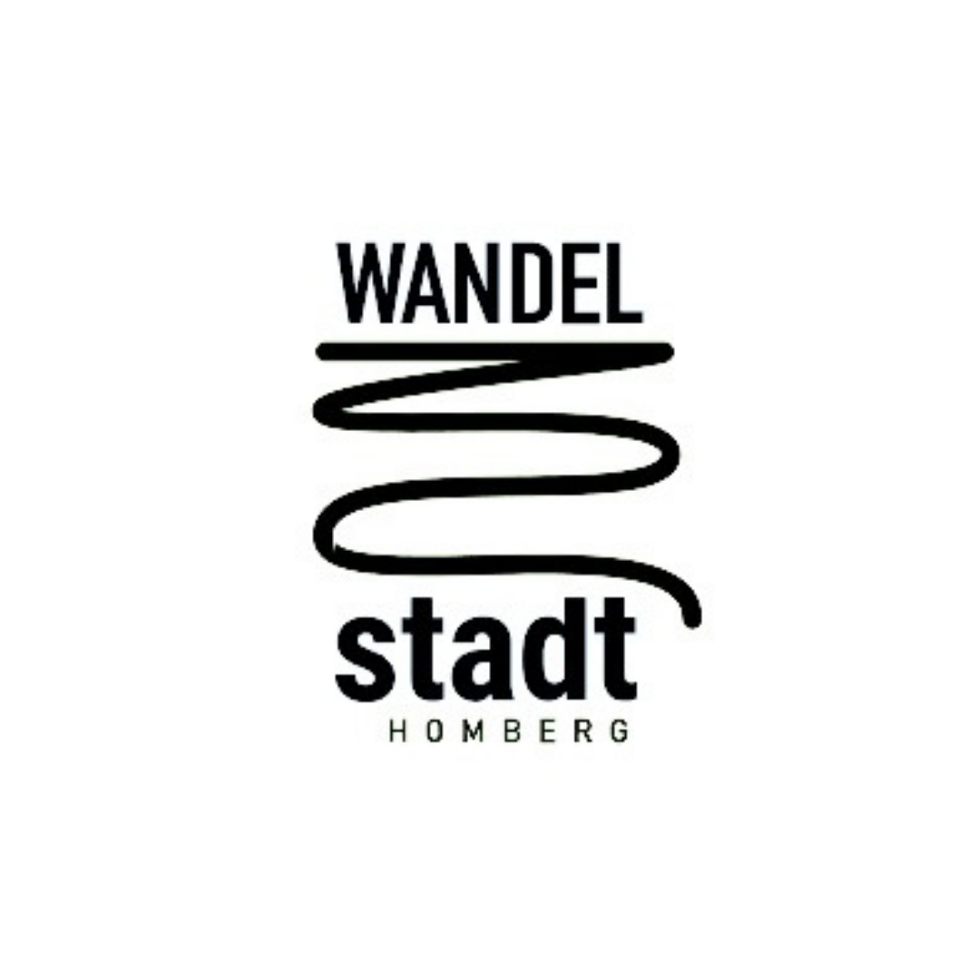 Logo der Stadt Homberg mit dem Schriftzug "Wandel" und einer stilisierten spiralförmigen Linie.