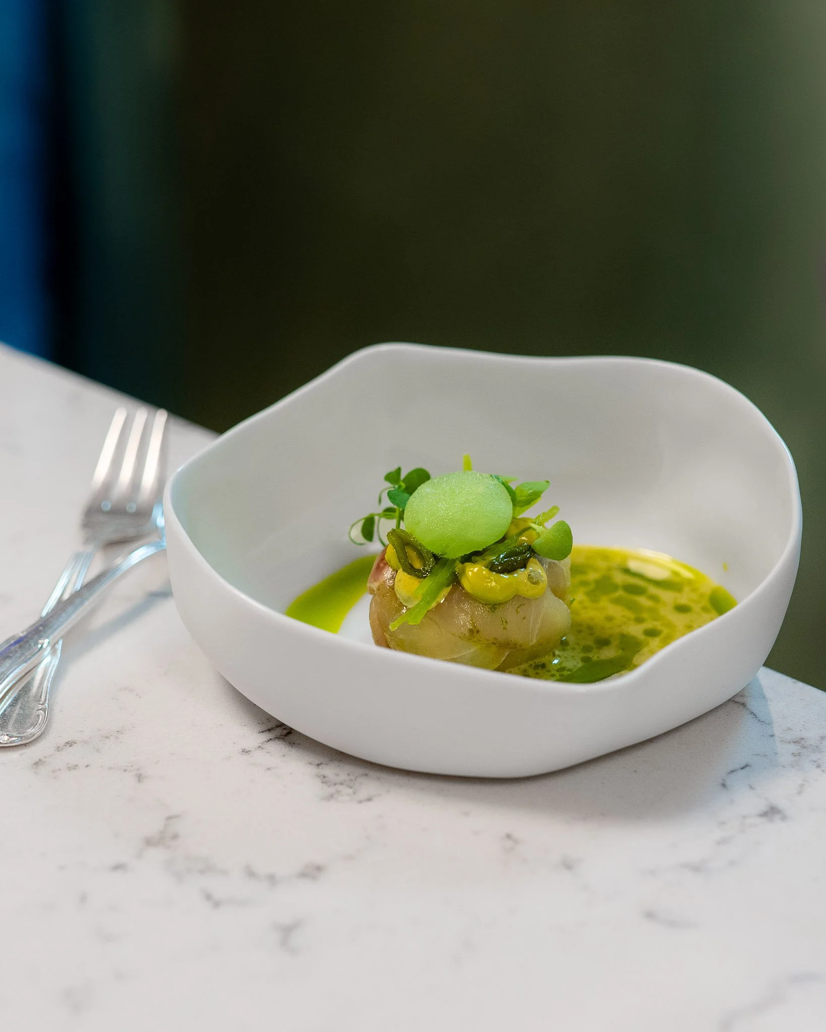 Een verfijnd en spannend signatuurgerecht van Michelinrestaurant Merlet, als voorproefje op het Roots of 2050 thema van Chefs in het Bos.