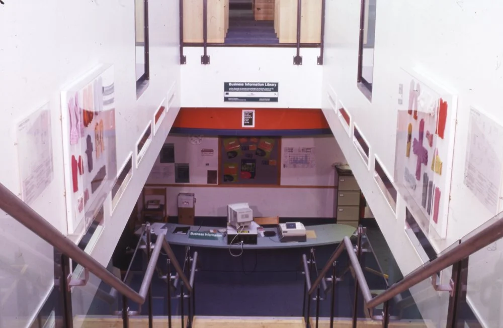 photograph of the artworks in situ in the stairwell of Shoreditch Library