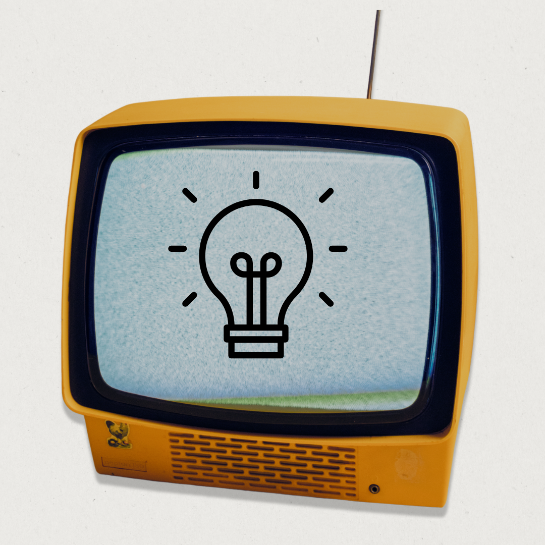 An old fashioned, square TV, showing a cartoon-style drawing of a lightbulb on the screen