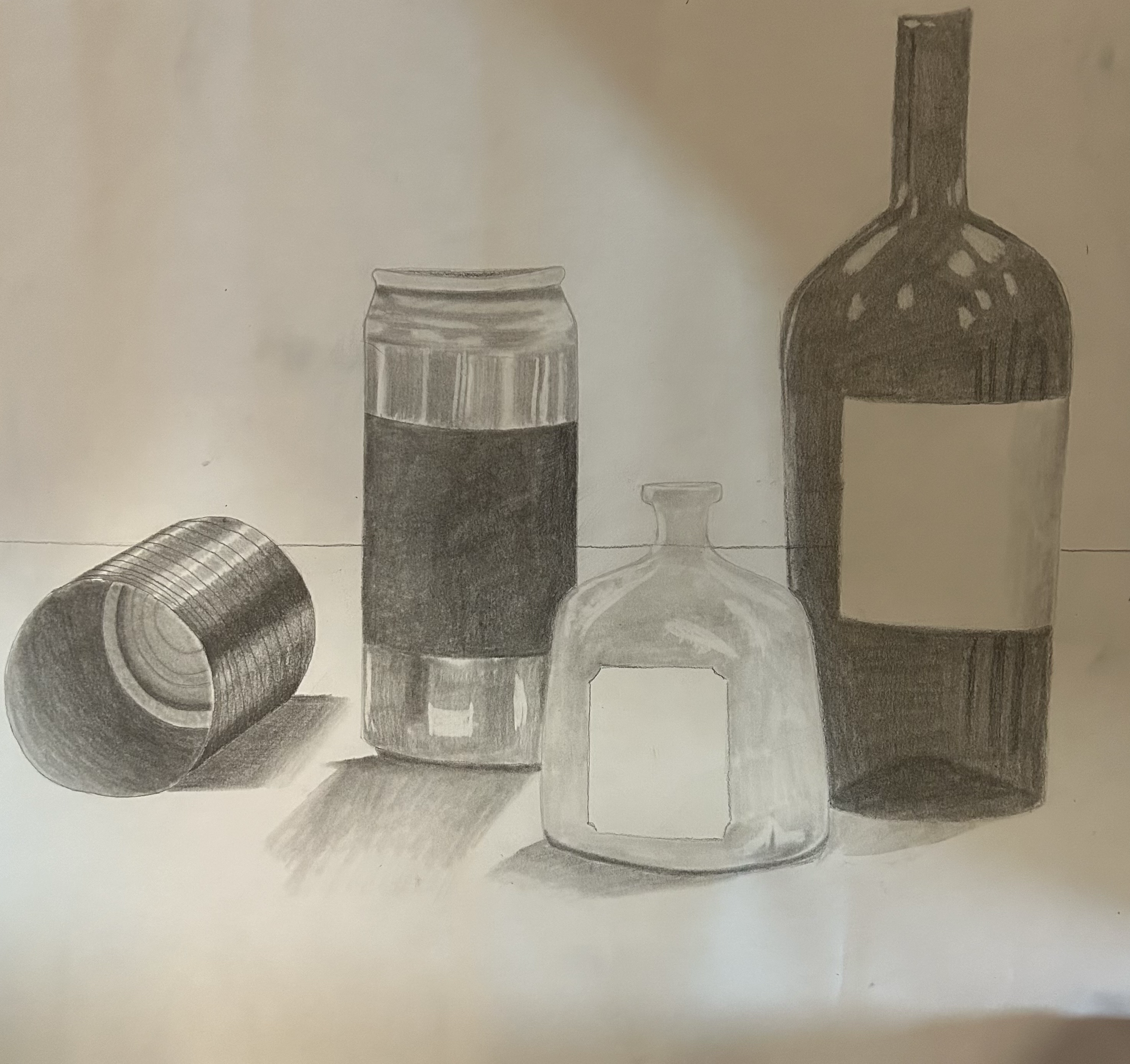 Bottles Still Life - I created this piece in a drawing class where the professor set up a bunch of bottle and we picked a section to draw. I used charcoal and sketching pencils.