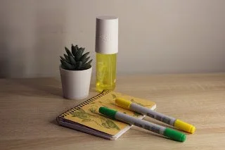 A still life picture containing items of yellow and green