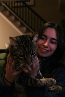 A portrait of a girl and her cat