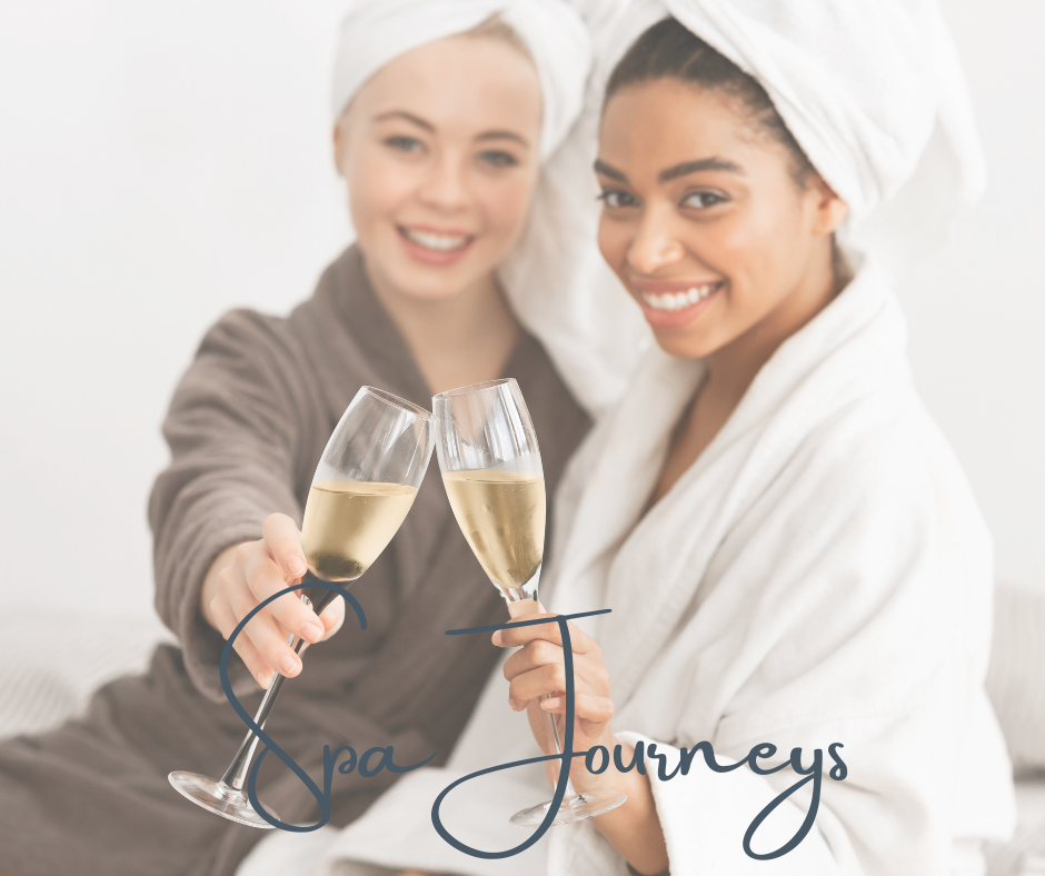 Two women in bathrobes with towels wrapped around their heads holding glasses of champagne, smiling at the camera, with the words 'Spa Journeys' written on the image.