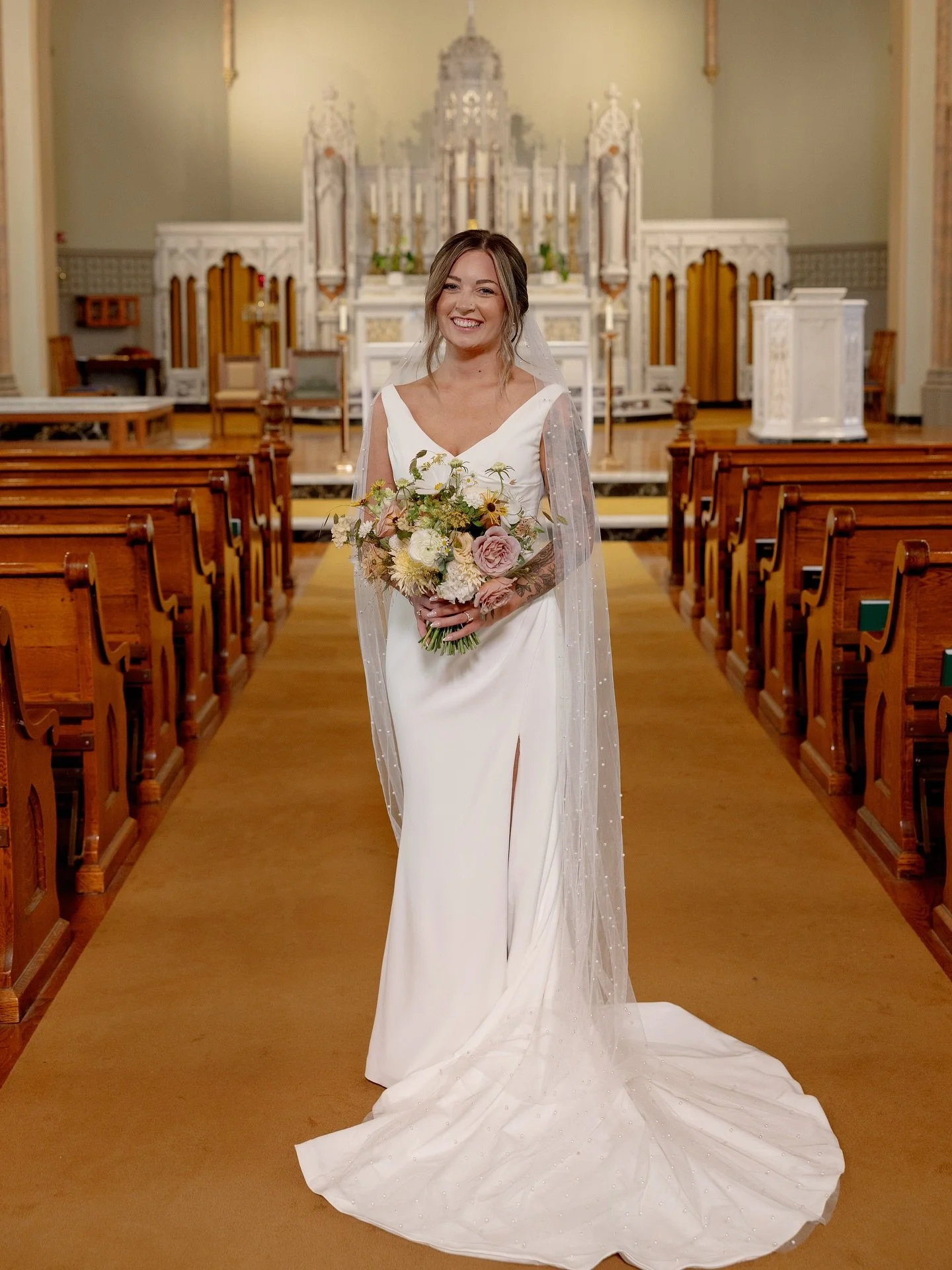 Same bride, but two different bouquets, hairstyles, and dresses! Shae came to me with the idea of having a separate bouquet for her intimate church ceremony and I was 100% on board! I love when my clients have these special little details that everyo