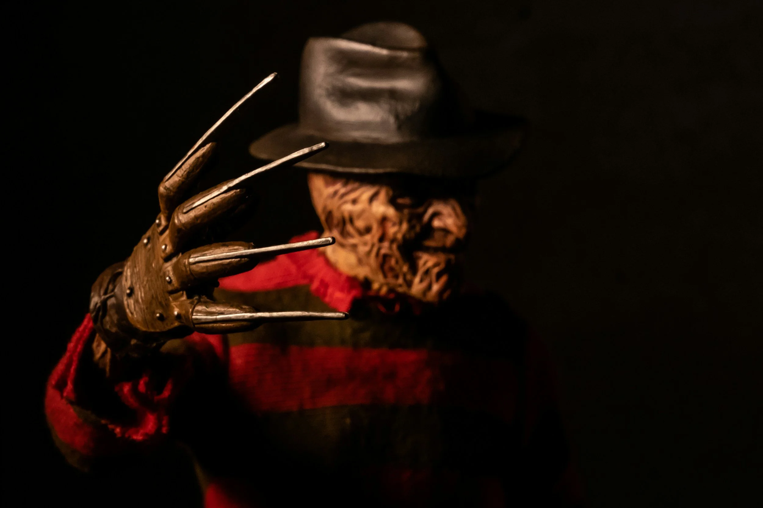 Slasher villain Freddy Krueger, symbolizing the fear of technology gone rogue in AI horror films.