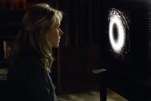 The Ring on the screen, symbolizing the Cursed Technology trope and the hypnotic risk of AI.