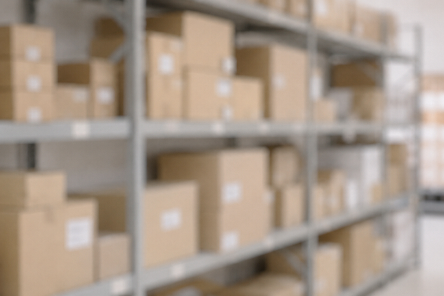 Blurred storage aisle with cardboard boxes