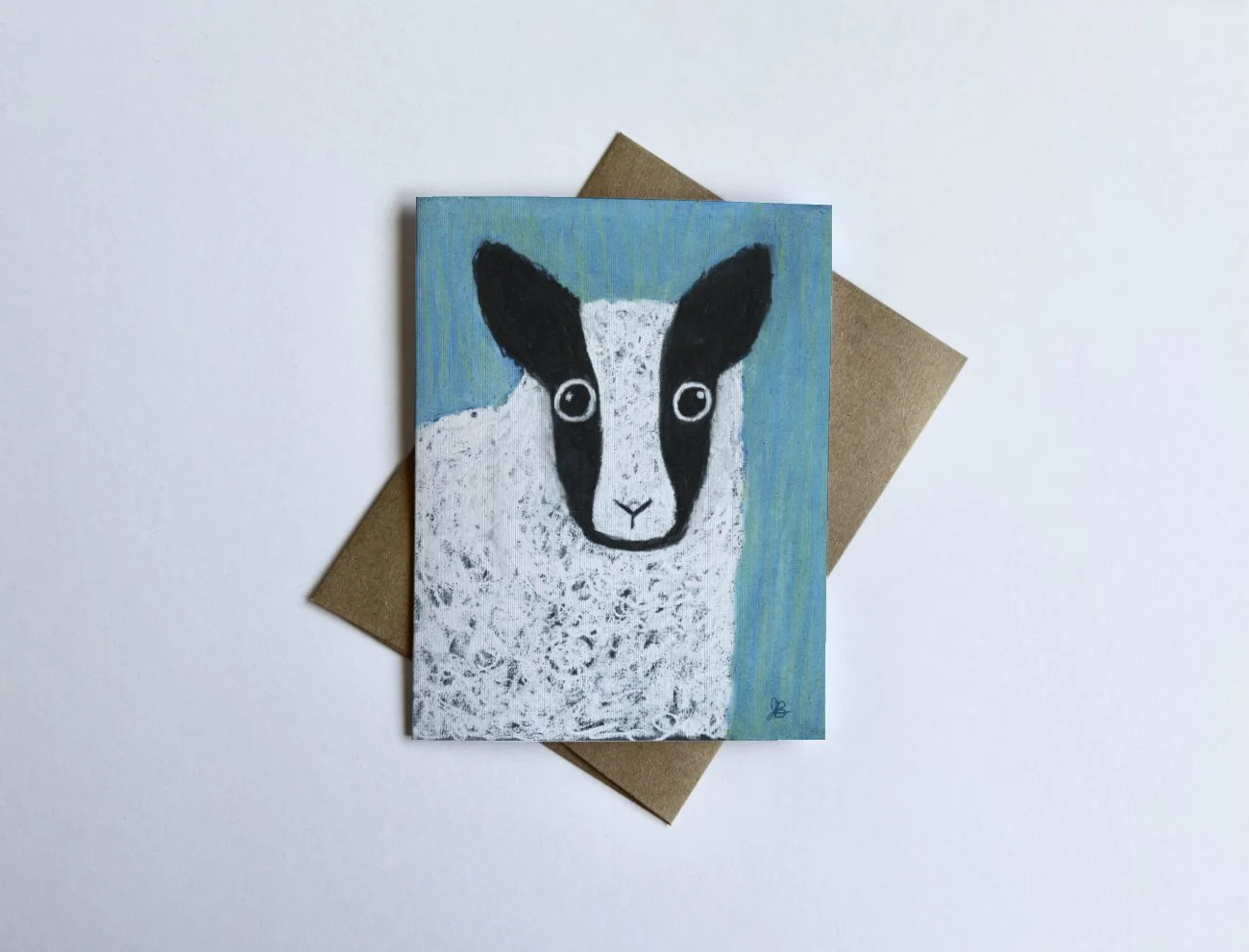 Pastel illustration of a whimsical silly sheep on a greeting card inspired by Psalm 23.
