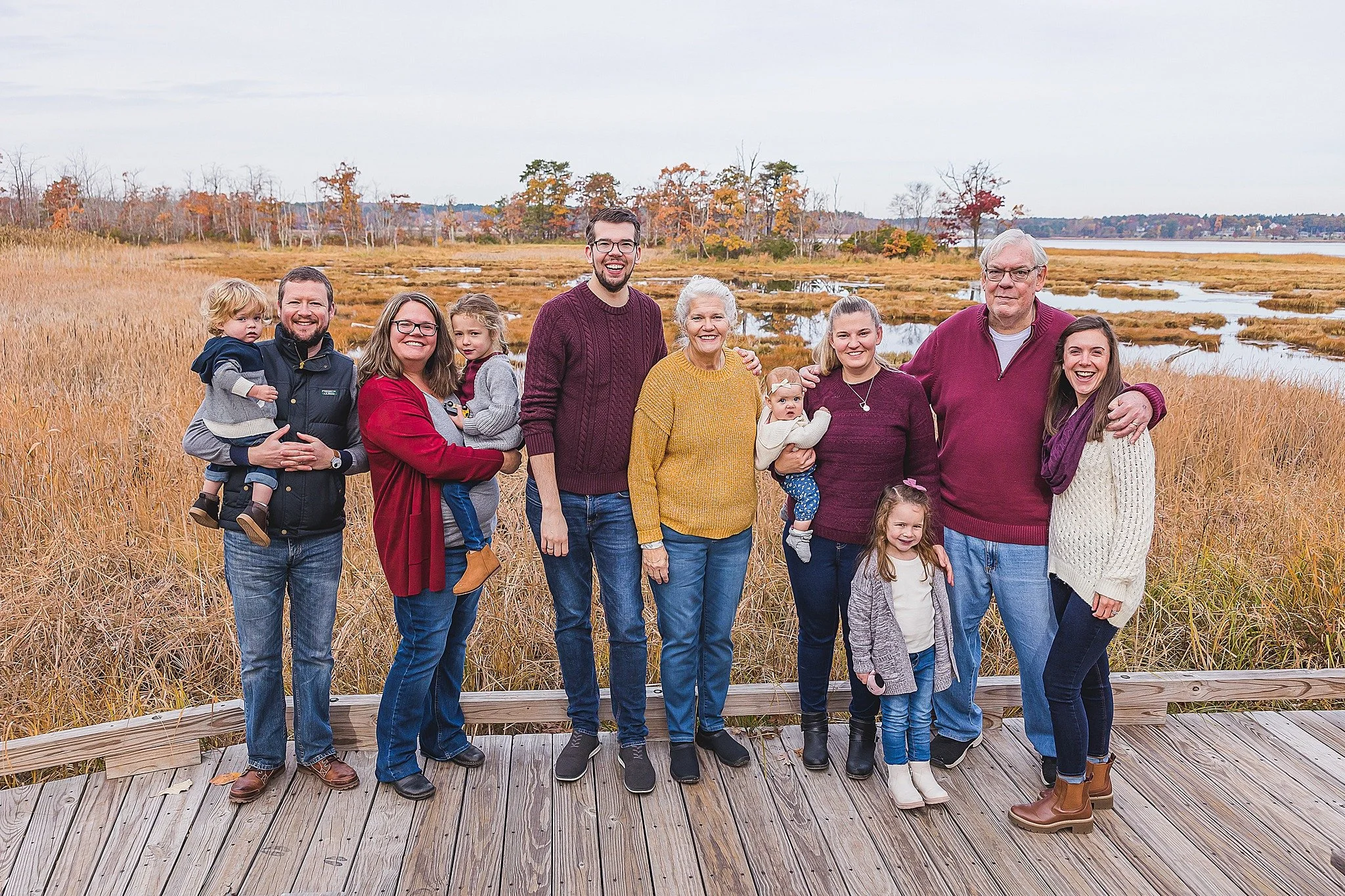 Family pose at Great Bay Discovery Center in New Hampshire
