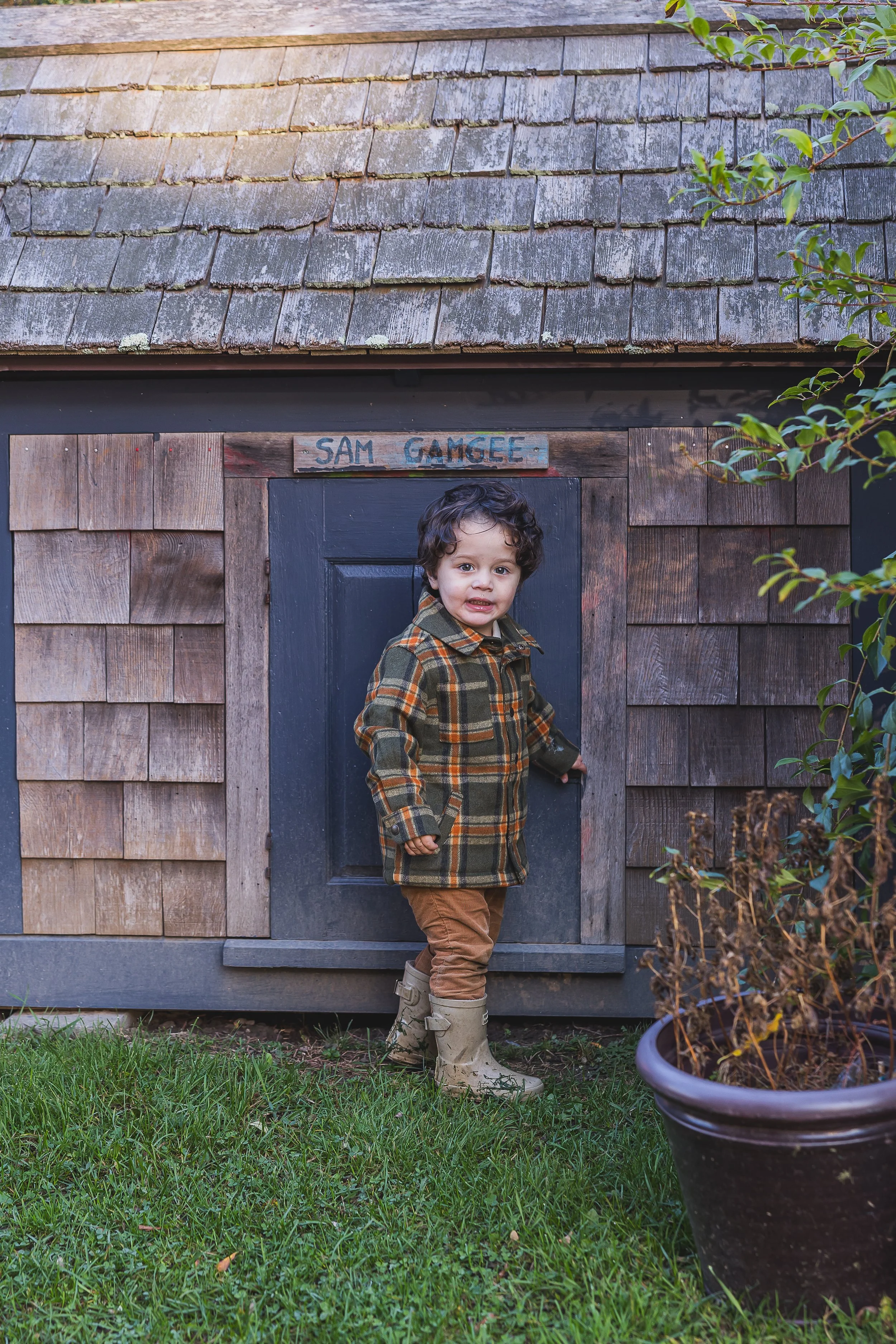 Young boy poses for New Hampshire family photographer