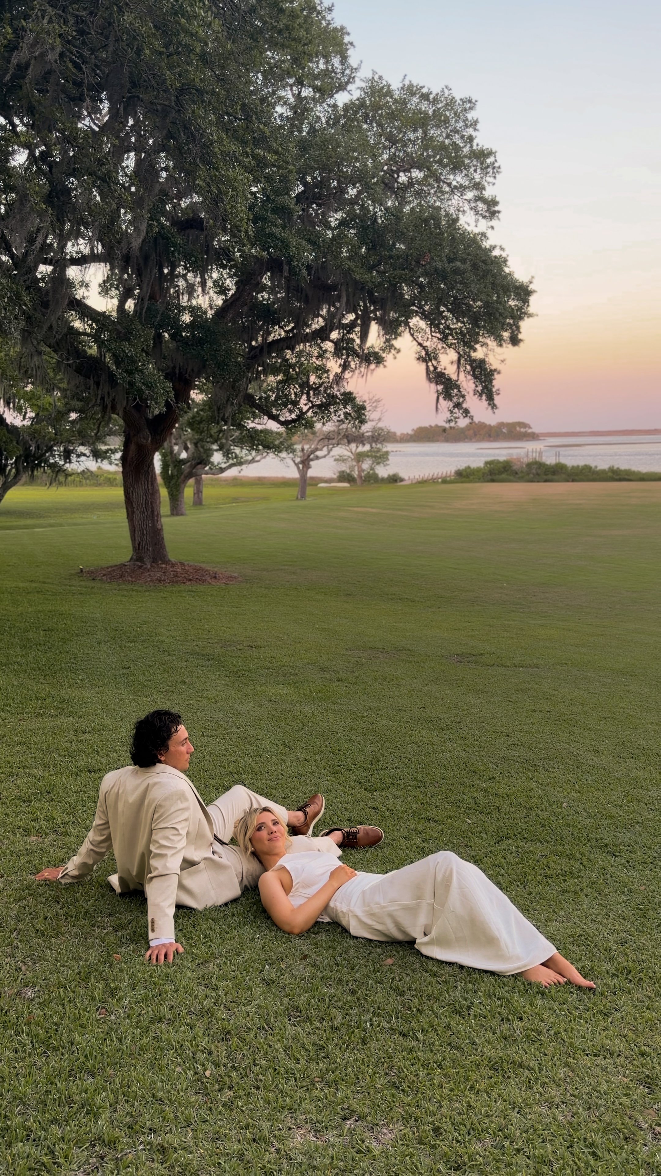 live oaks inspire and preserve wedding couple relaxing by wilmington content co - content creator in north carolina