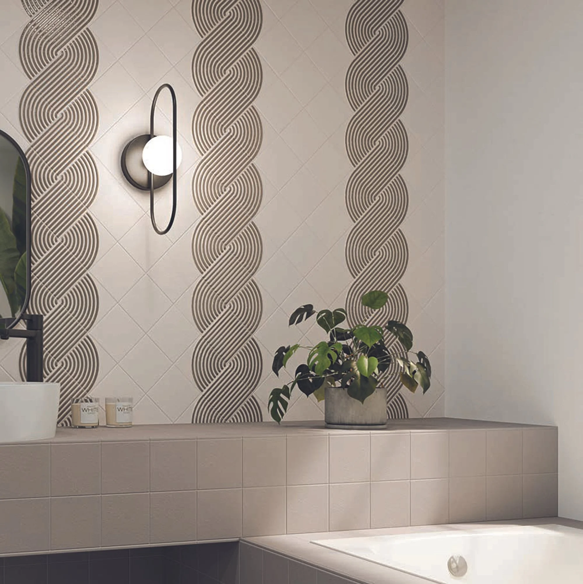 Decorative wall with geometric patterns and indoor plants in a modern bathroom.