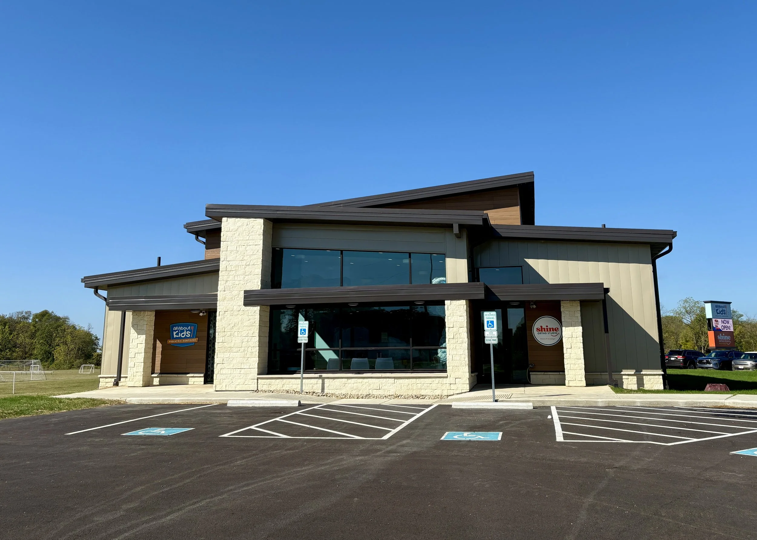 hine Ortho Studio office building in Defiance, Ohio with modern glass front and shared entrance