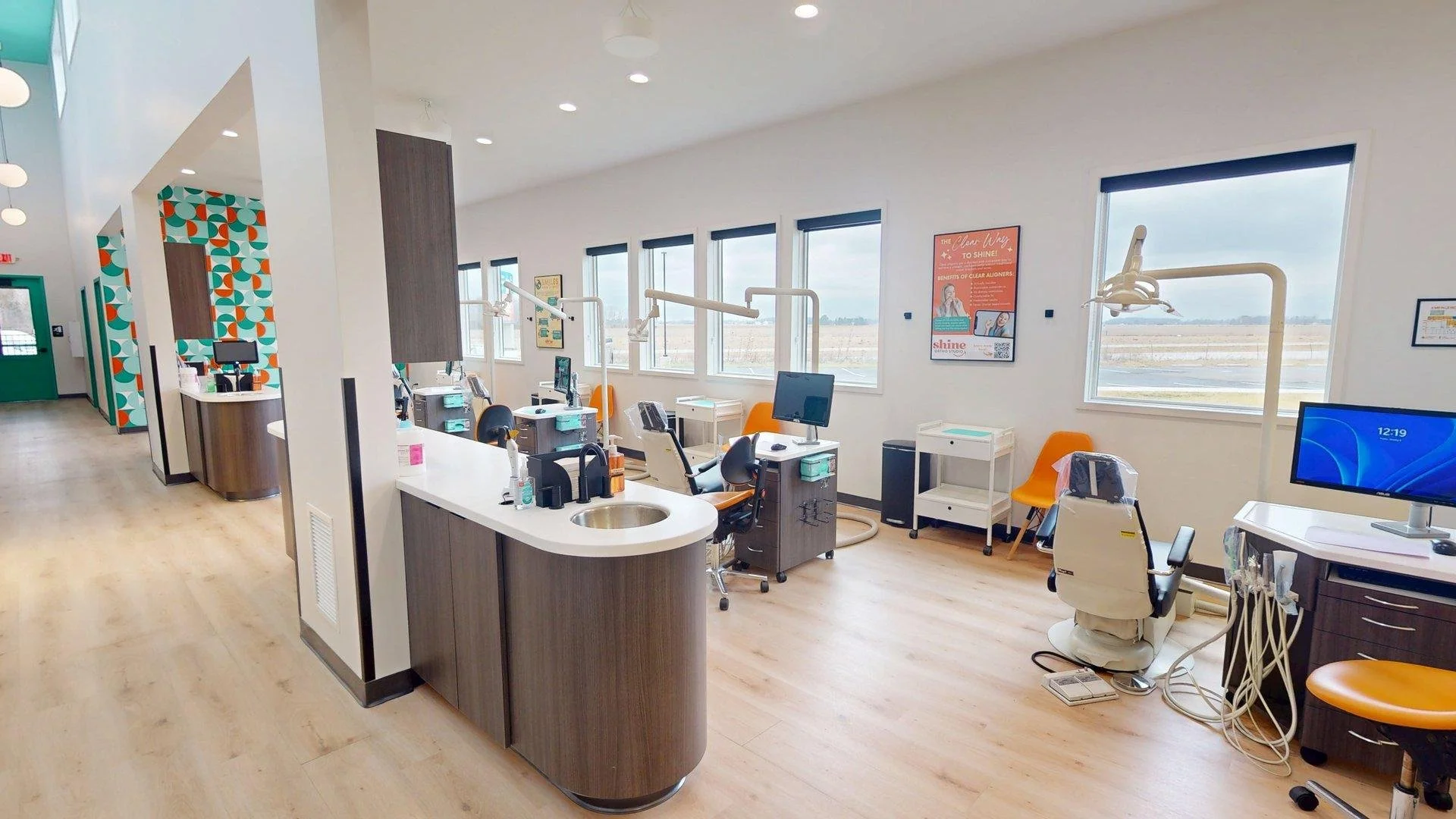 Orthodontic treatment area at Shine Ortho Studio featuring modern operatories, dental chairs, and advanced orthodontic equipment.