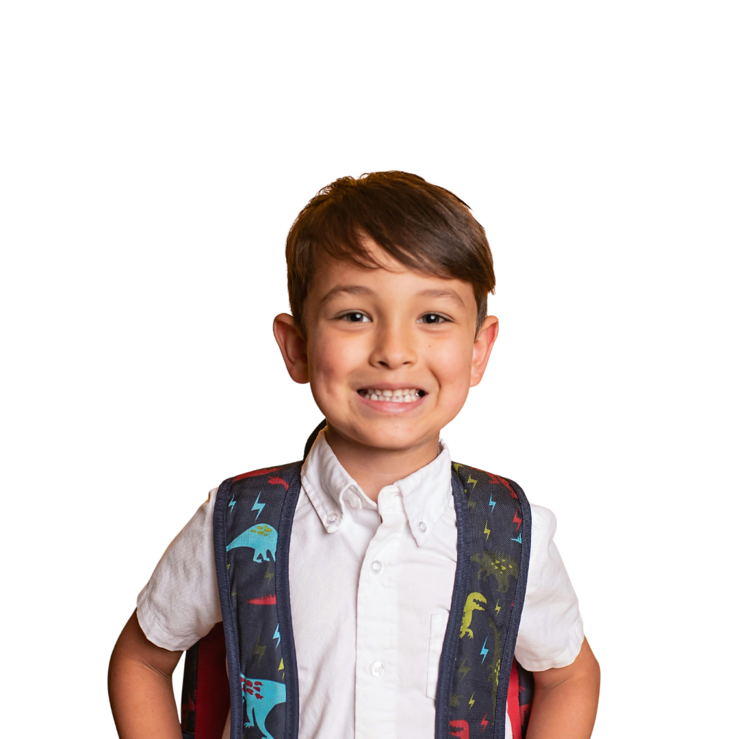 Young boy smiling with straight teeth, representing early orthodontic treatment at Shine Ortho Studio.