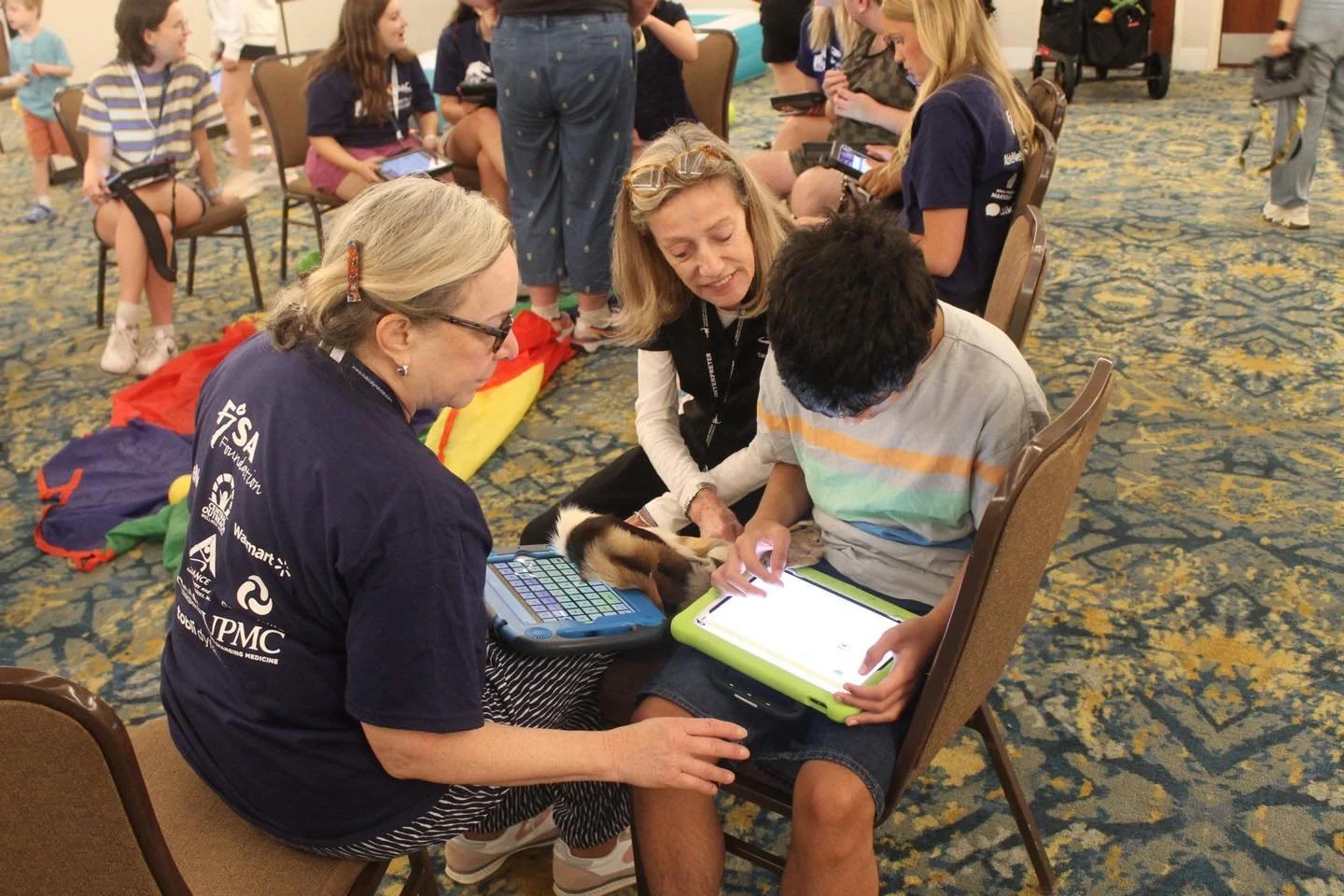 The Natural History Museum came to #ICAN #AAC Camp. This camper wants to say that animal hide is &ldquo;gazelle!&rdquo; He&rsquo;s working intently, navigating the voice output tablet and scanning alphabetically for the word. Amazing effort by him - 