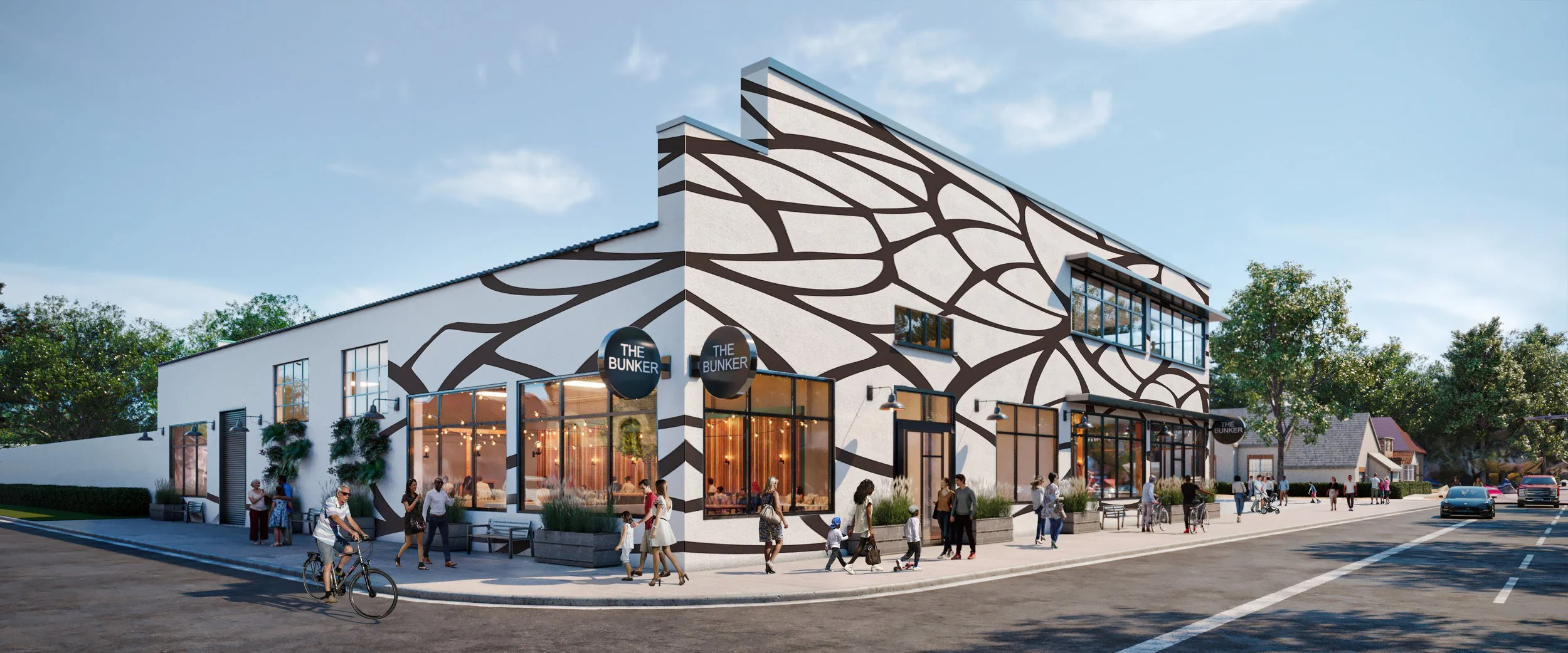 Modern building with black abstract mural, large windows, and signs reading
