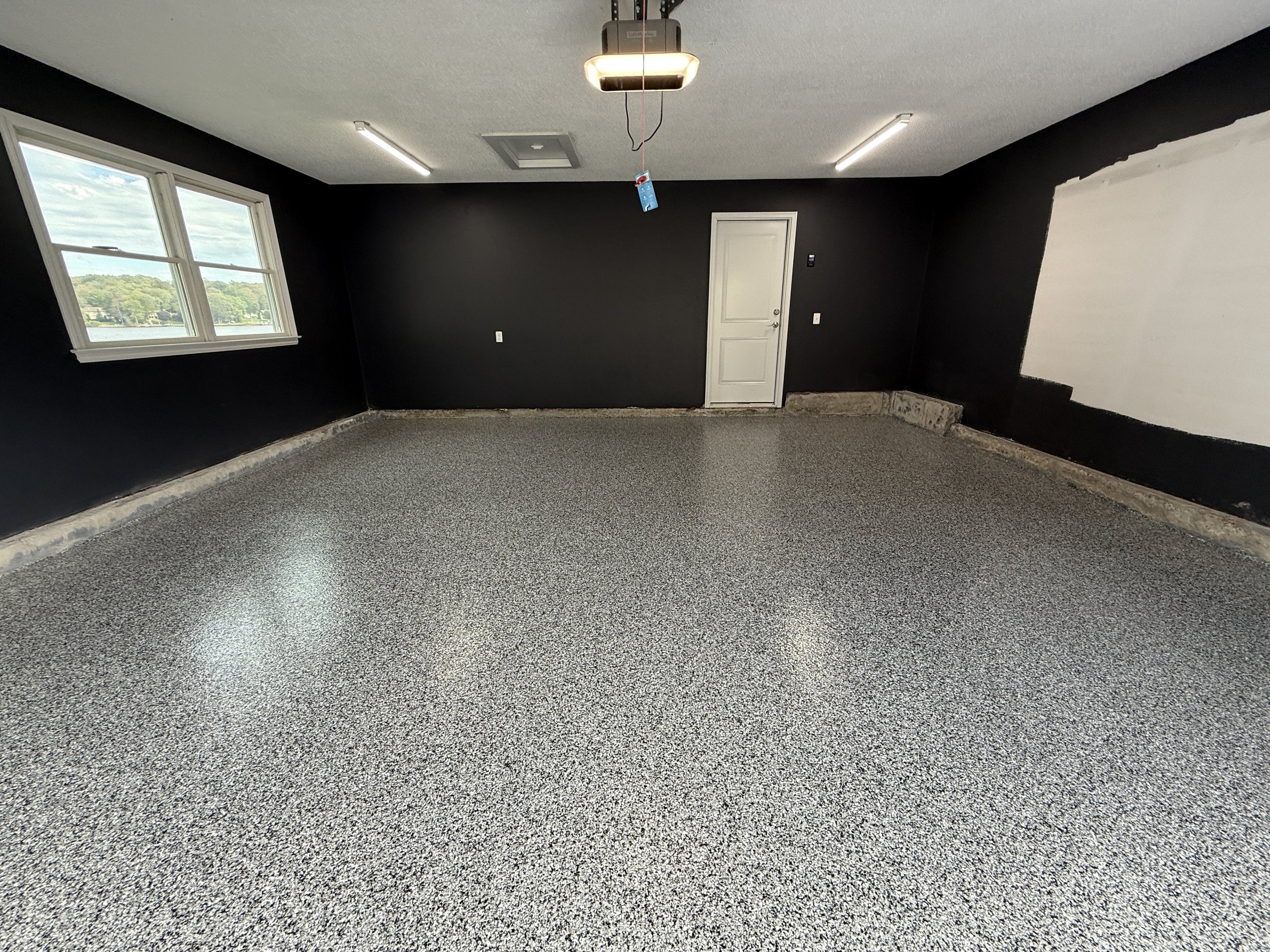 Planning a Garage Gym or Workshop in Manchester CT? Start With the Floor