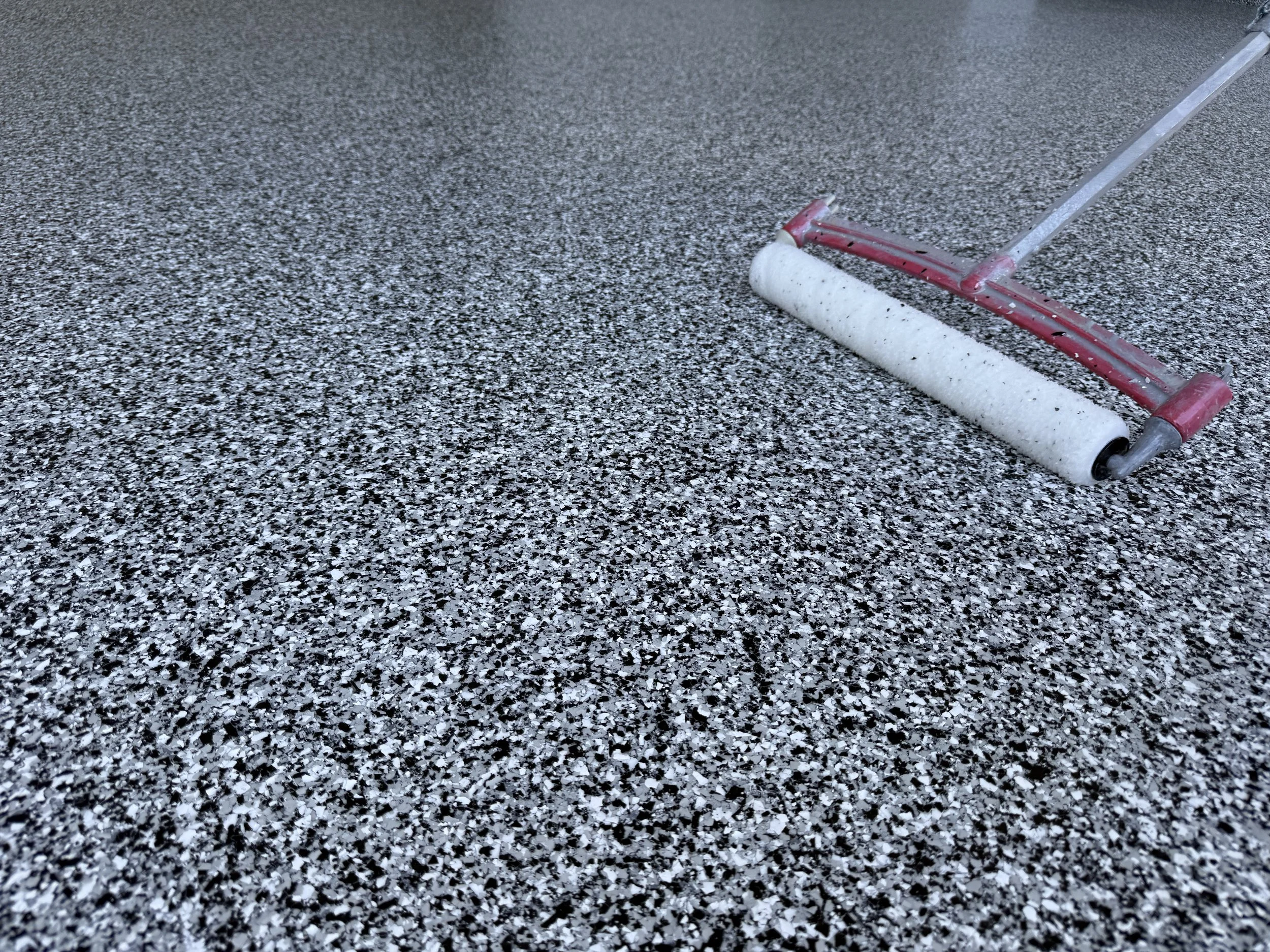 How to Clean and Maintain a Coated Garage Floor in Manchester CT