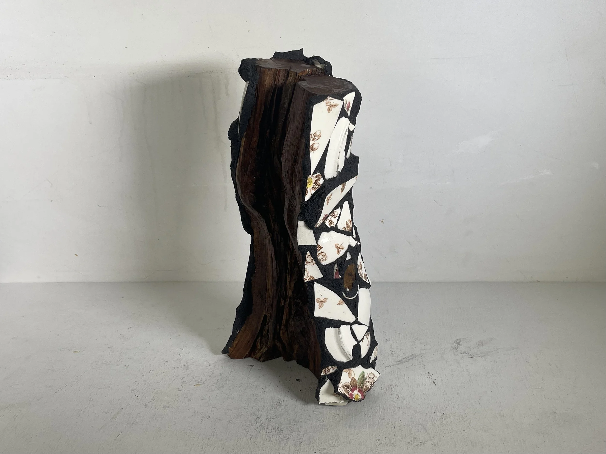 When The Water Flows, And The Insects Wake, Then The Time Runs Past / 
wood, grout, broken dishware / 
15 1/2" x 8 1/2" x 4 1/2"