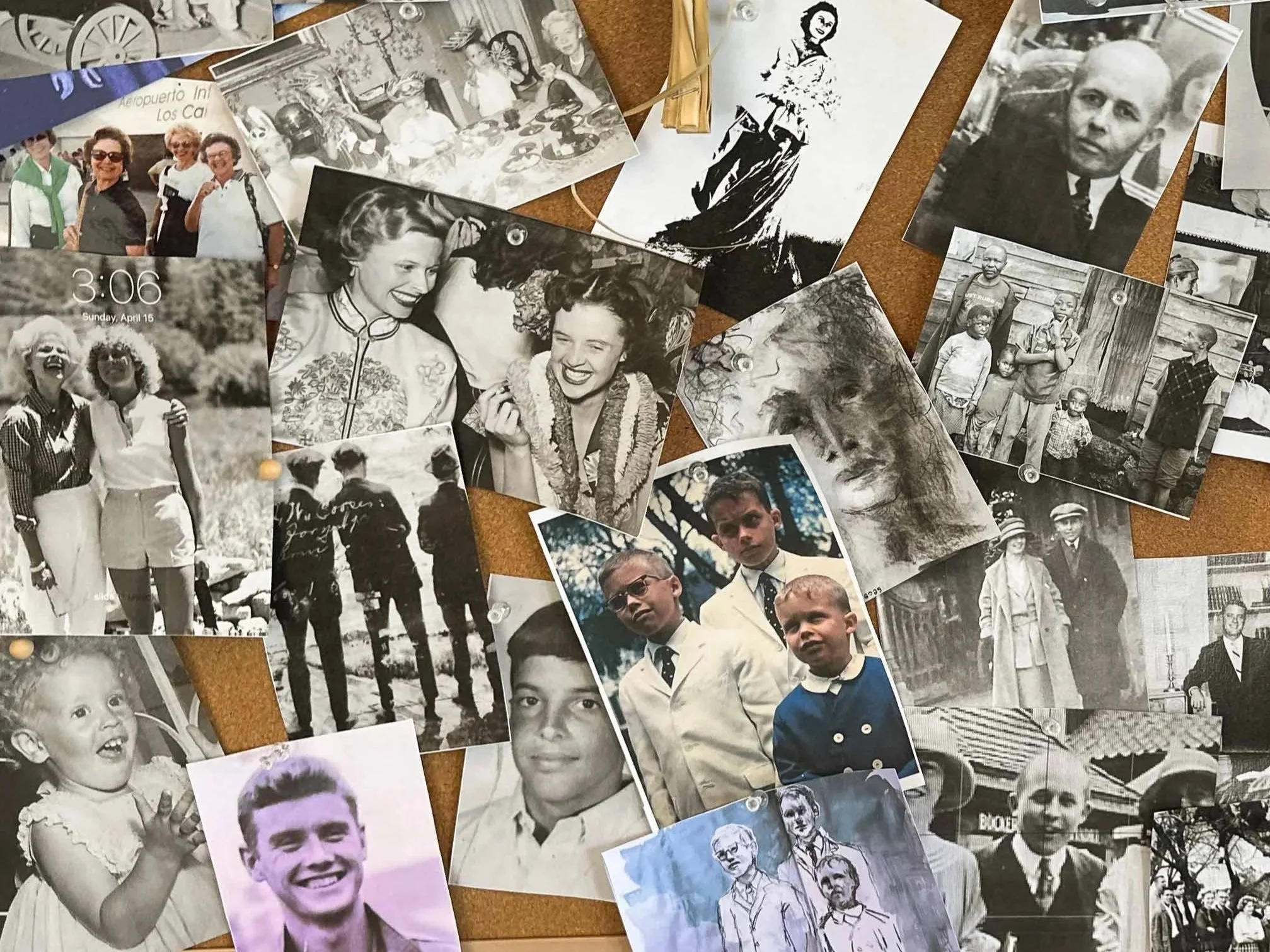 A corkboard covered with a variety of black-and-white and color photographs of different people, including children, families, and individuals, some in candid moments and some posed.