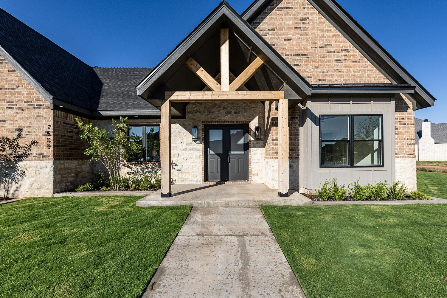 Exterior-wood-accents-luxury-home.jpg