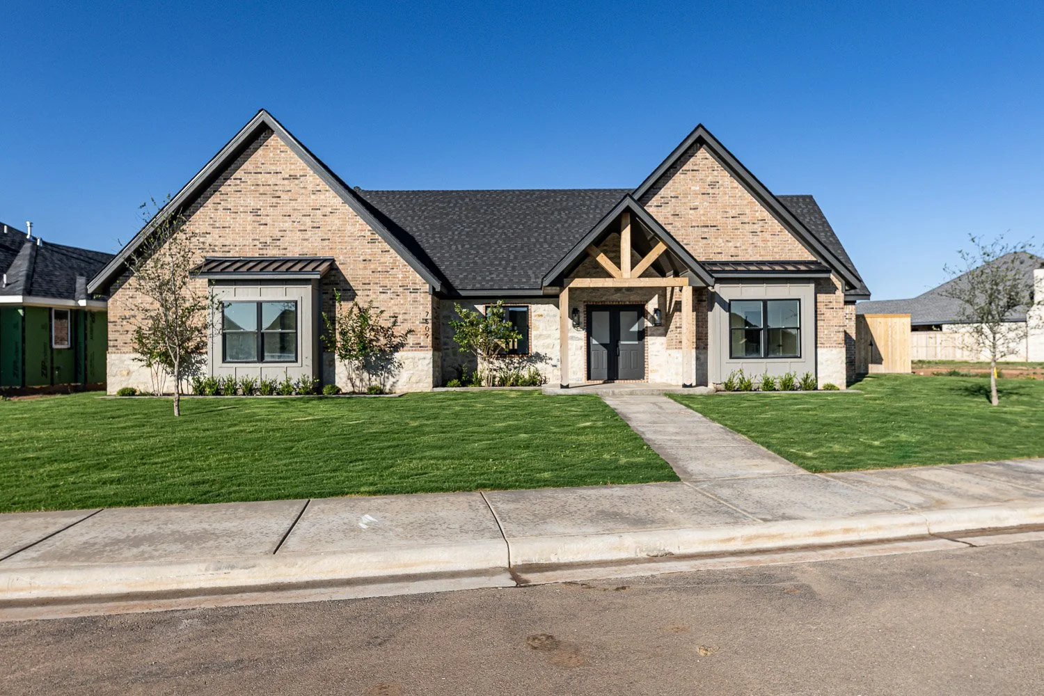 Stone-and-Brick-Exterior-Custom-Home.jpg