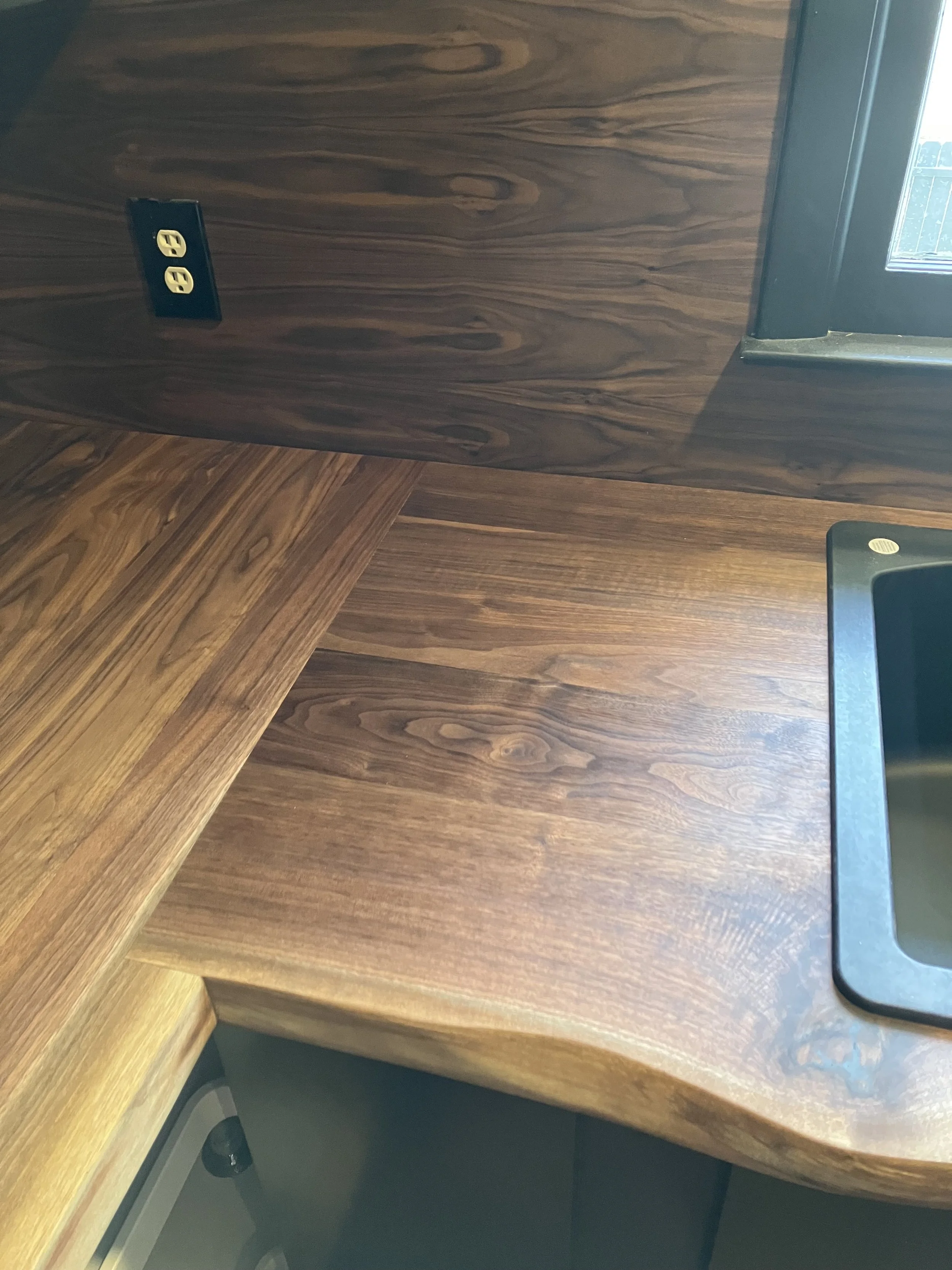 Walnut kitchen countertop with live edge and butt joint