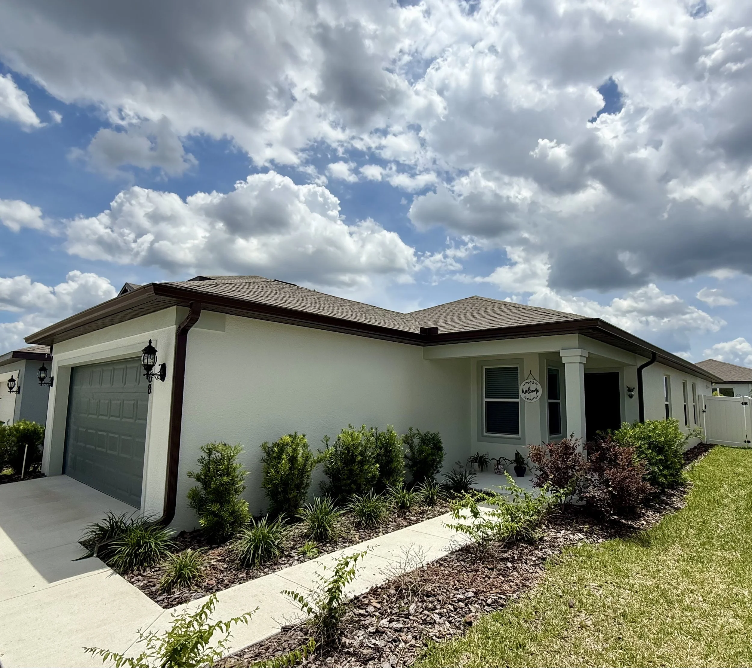 Royal Brown seamless gutters and downspouts installed on home in Brooksville, Florida