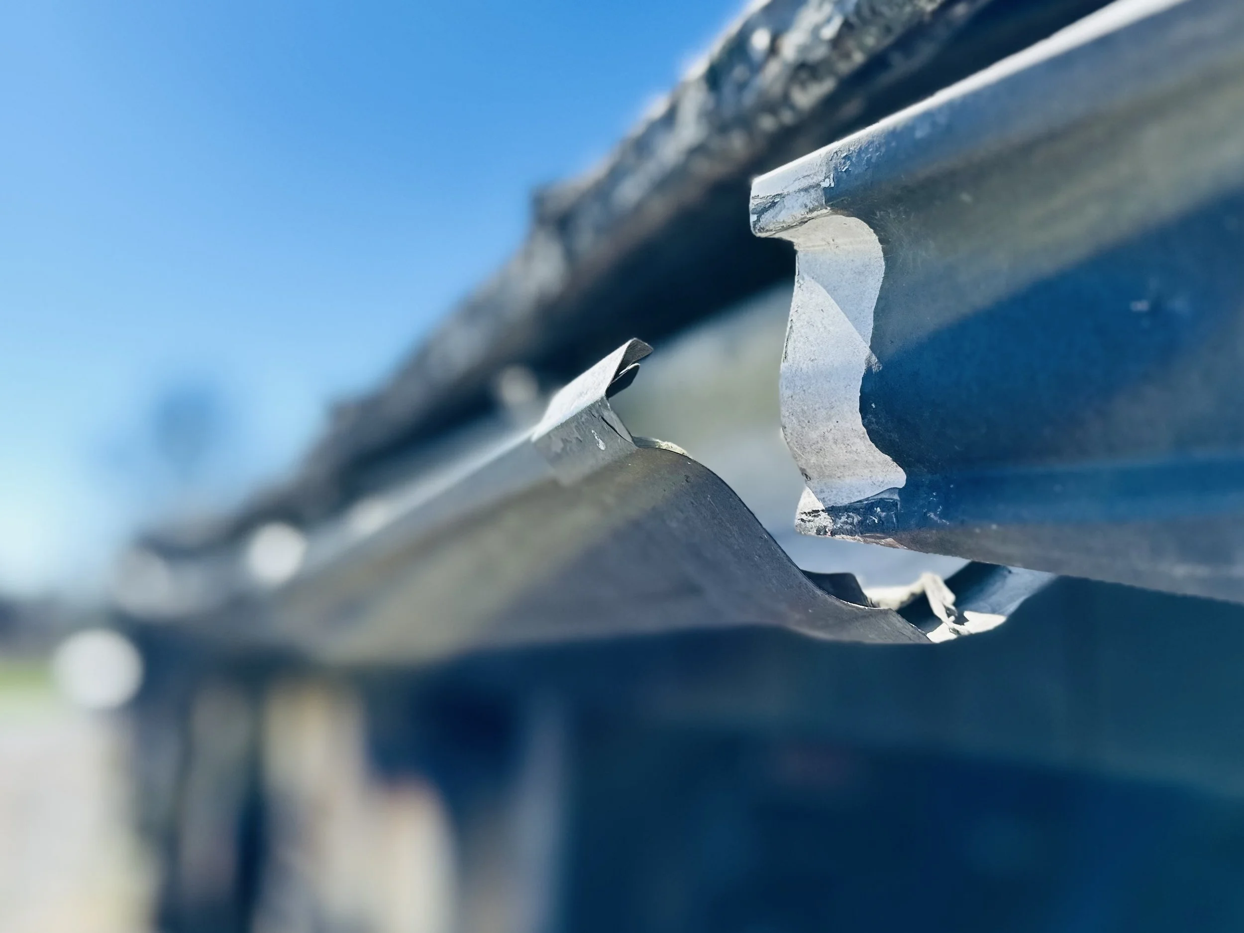 Damaged rain gutter in need of repair
