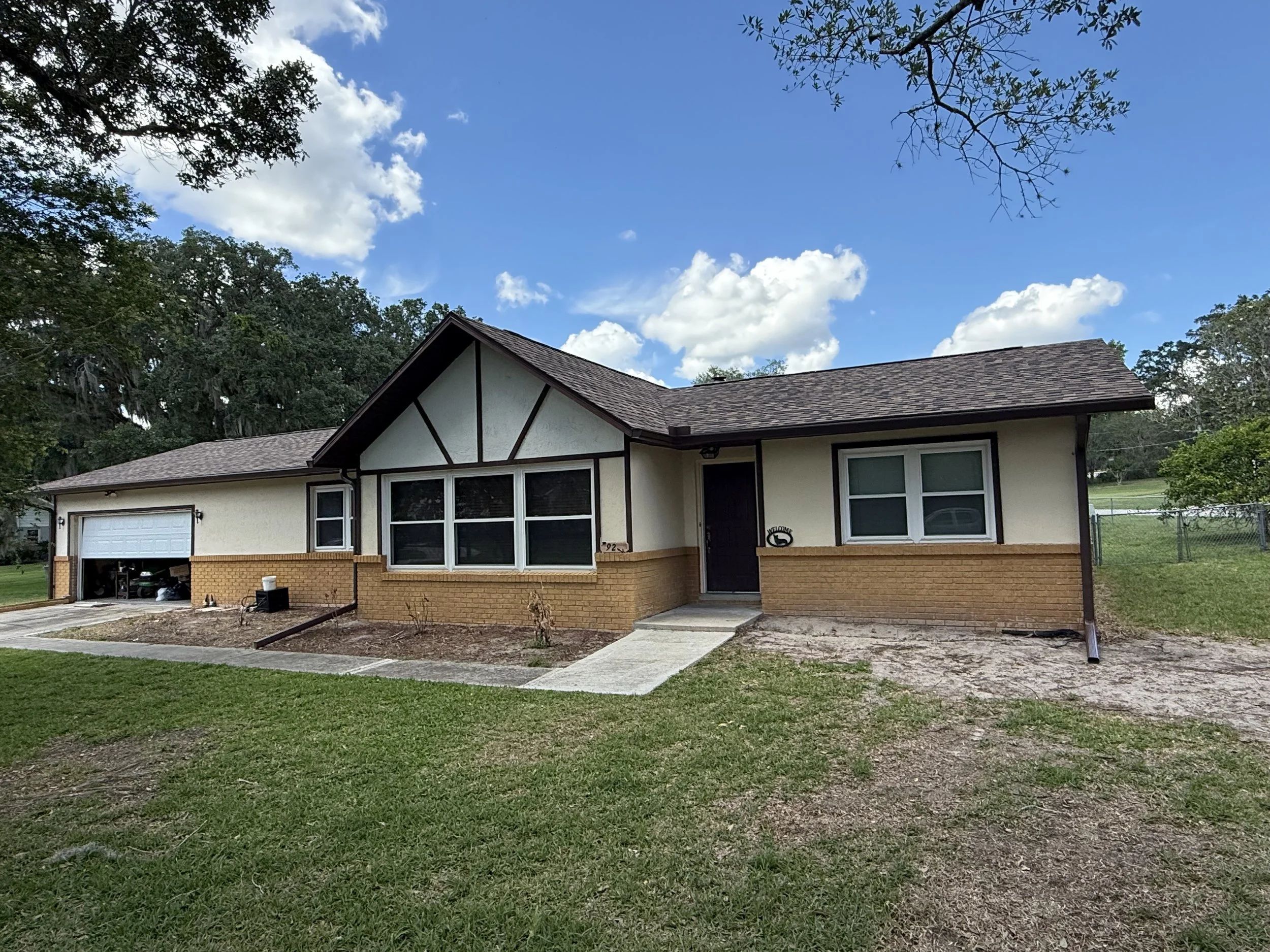 Royal Brown seamless gutters and downspout installed on home in Southeast Ocala, Florida