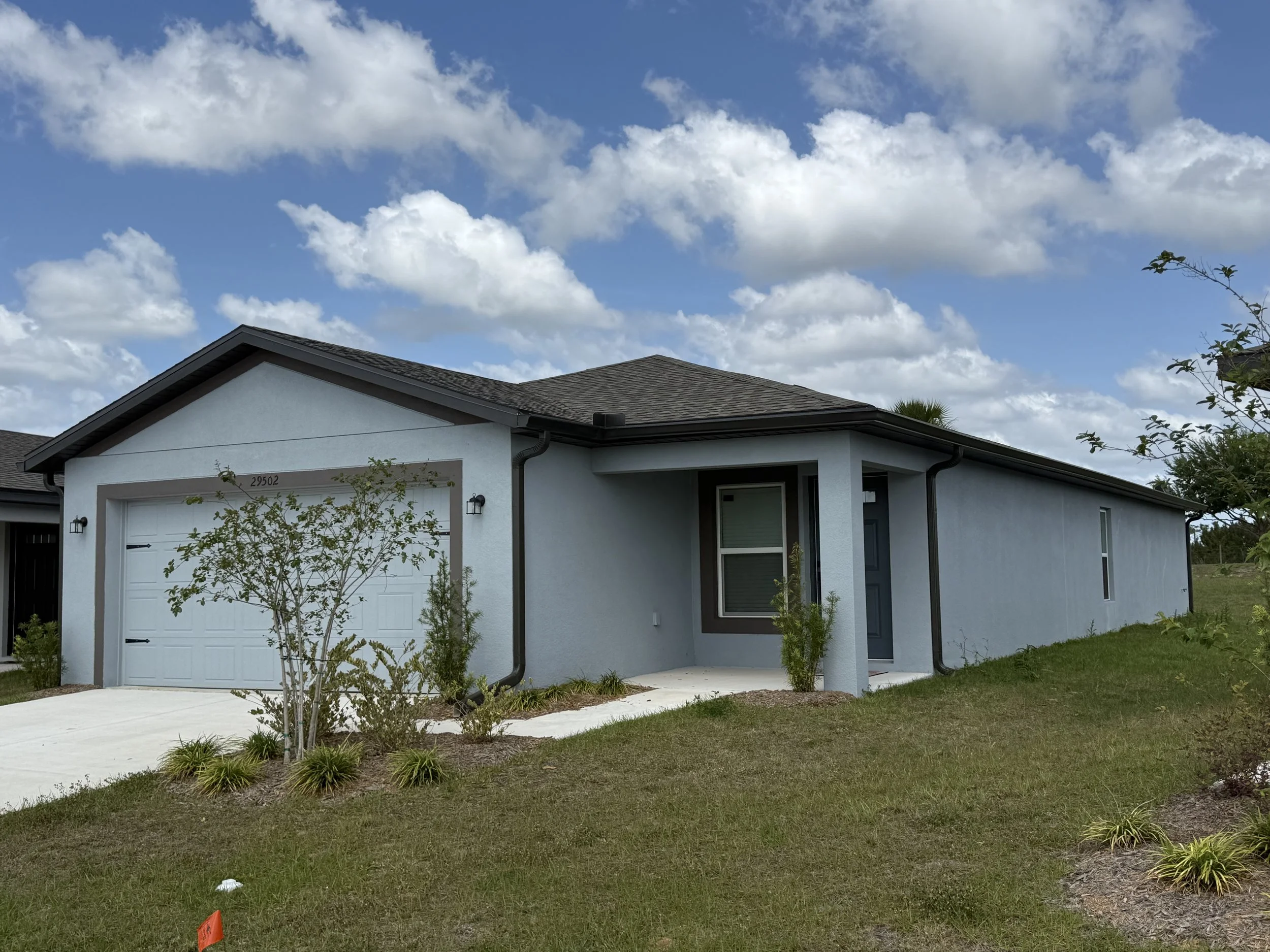 Dark Bronze seamless gutters installed on a home in Brooksville, Florida