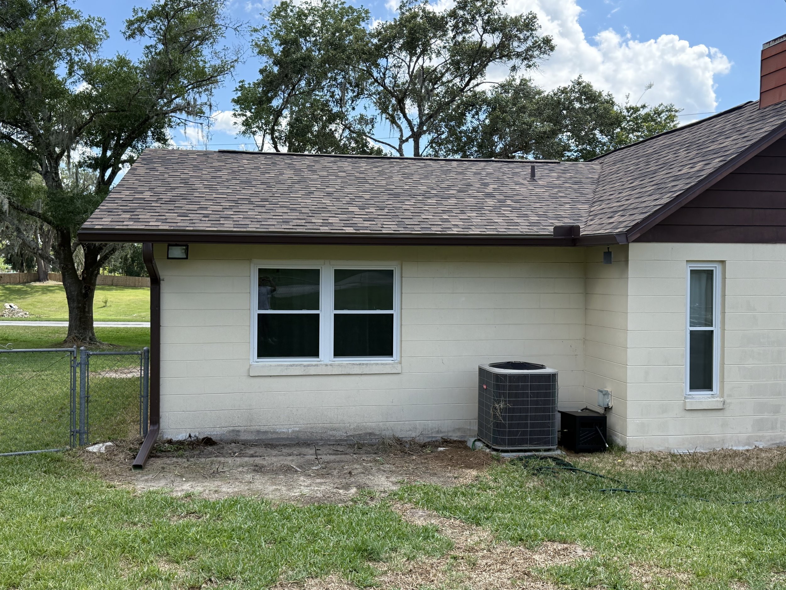 Royal Brown seamless gutter installation on established home in Southeast Ocala, Florida