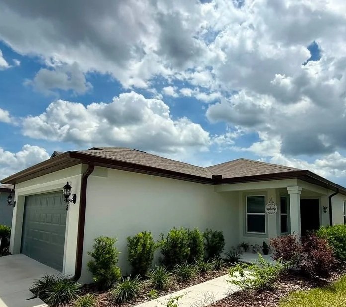 Royal Brown seamless gutters installed on a home in Brooksville, FL