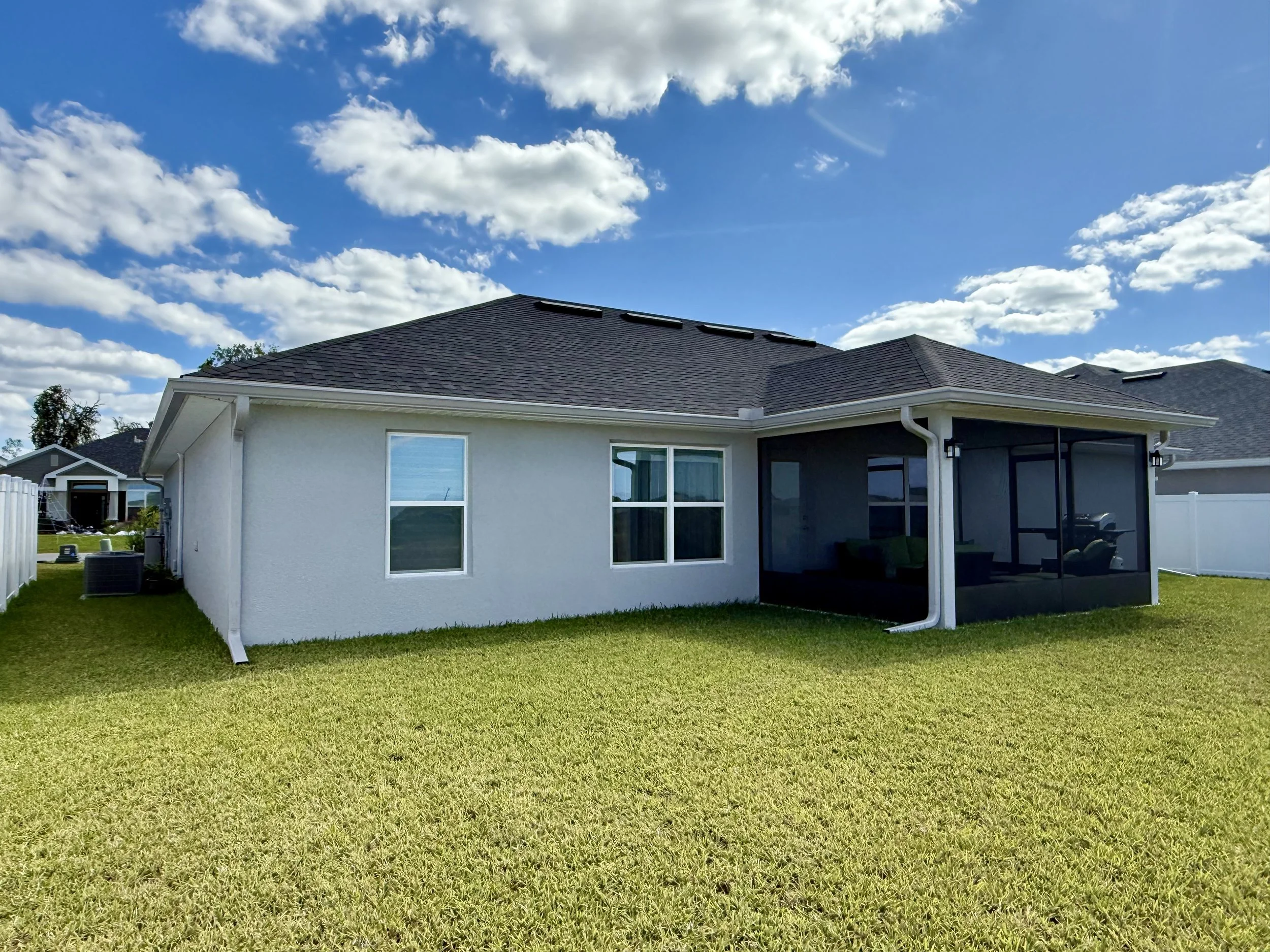 Victorian Gray seamless gutters installed on back of home in Dunnellon, Florida
