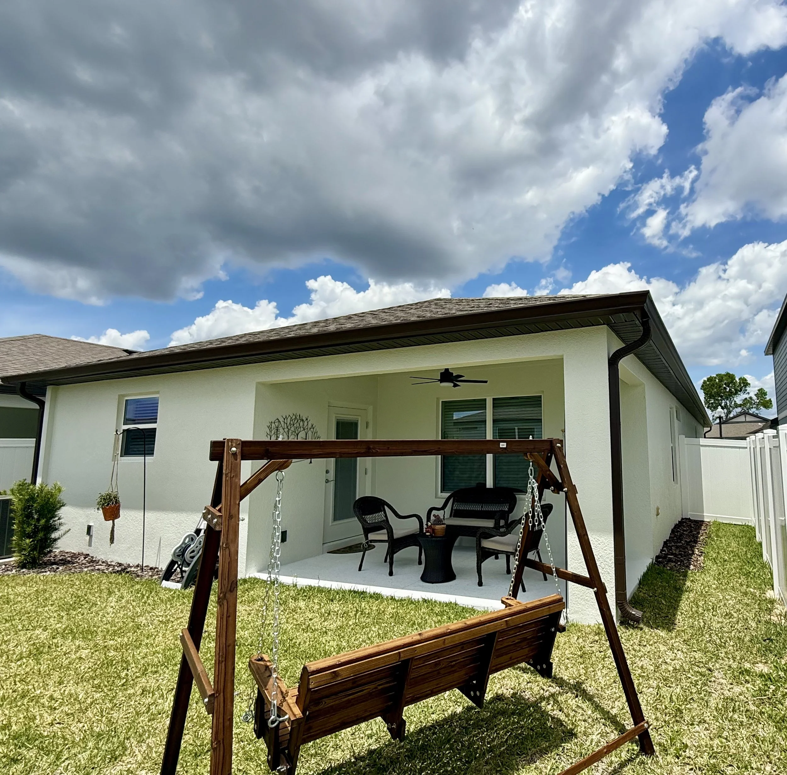 Royal Brown seamless gutters and downspouts installed on home in Brooksville, Florida