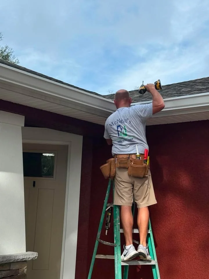 White 6-inch seamless gutter installation completed by McNeal's Seamless Gutters on a home in Ocala, Florida.
