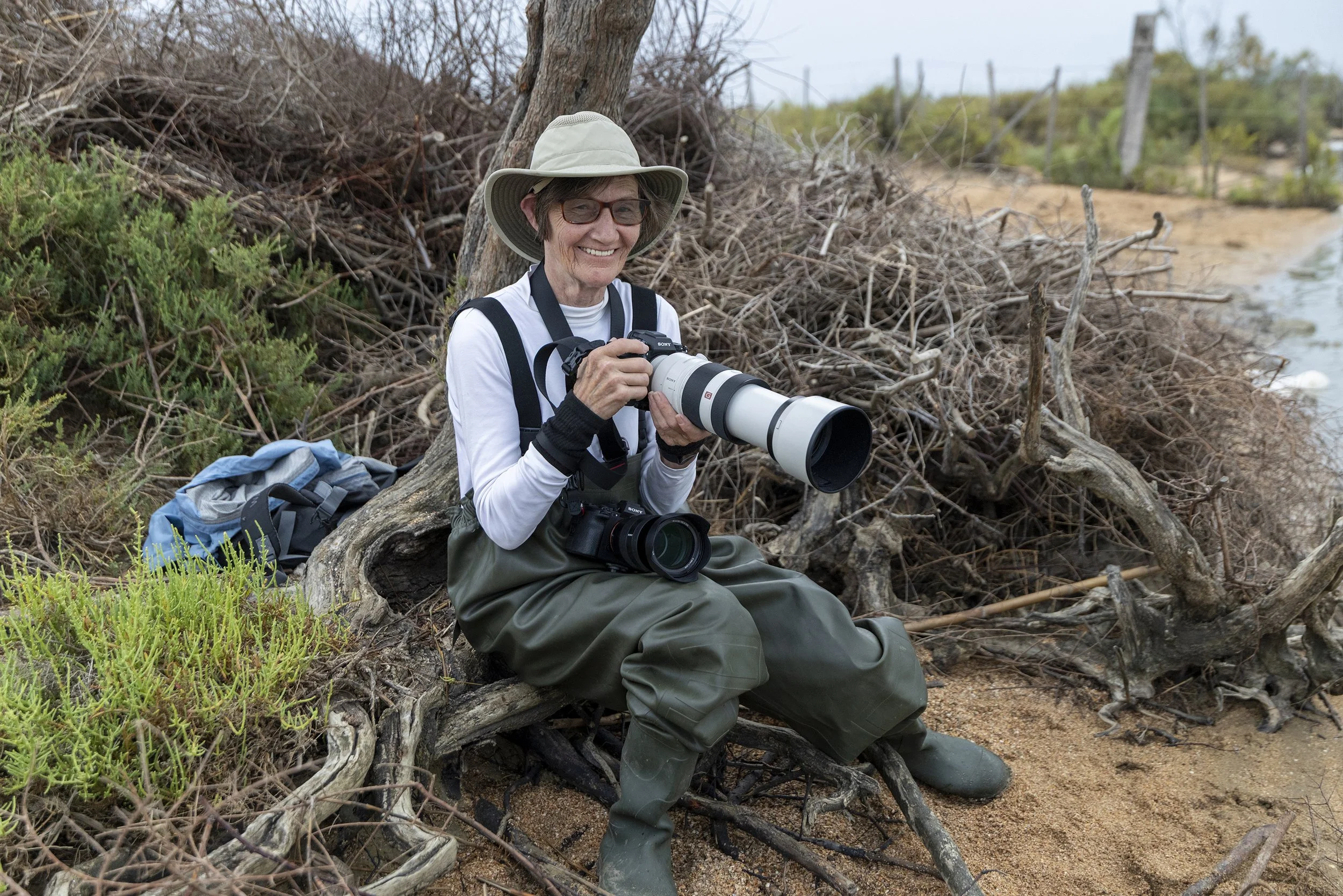 Workshop participants exploring and photographing the landscapes and the white horses of the Camargue, France.