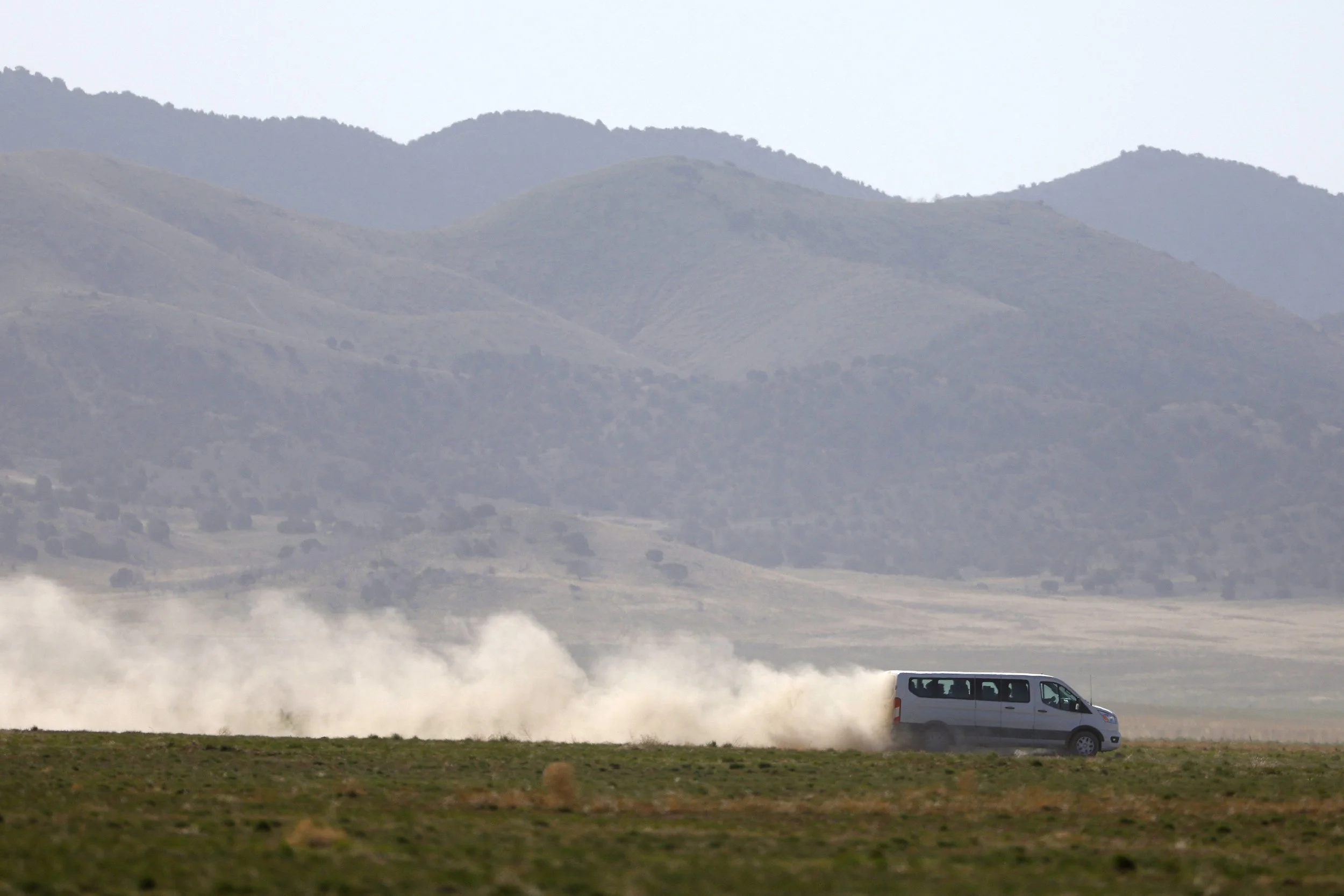 Van rolling across the West Desert in Utah.