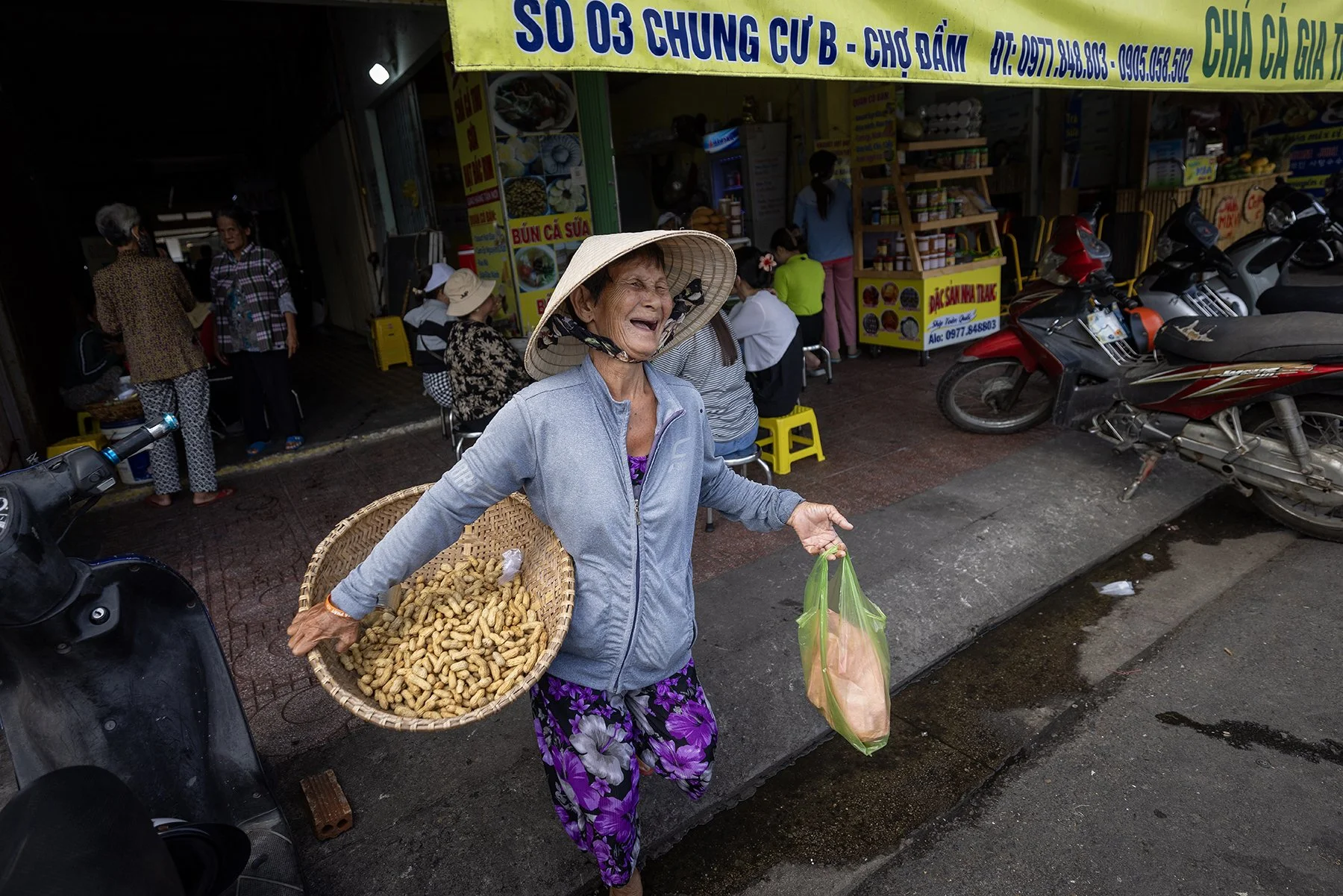 Happy peanut vendor at the Nah Trang Vietnam market