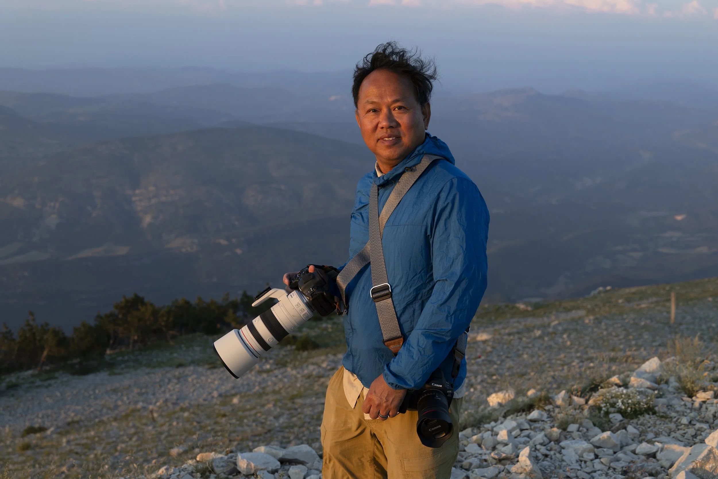 Workshop participant photographing the view from the summit of Mont Ventoux.